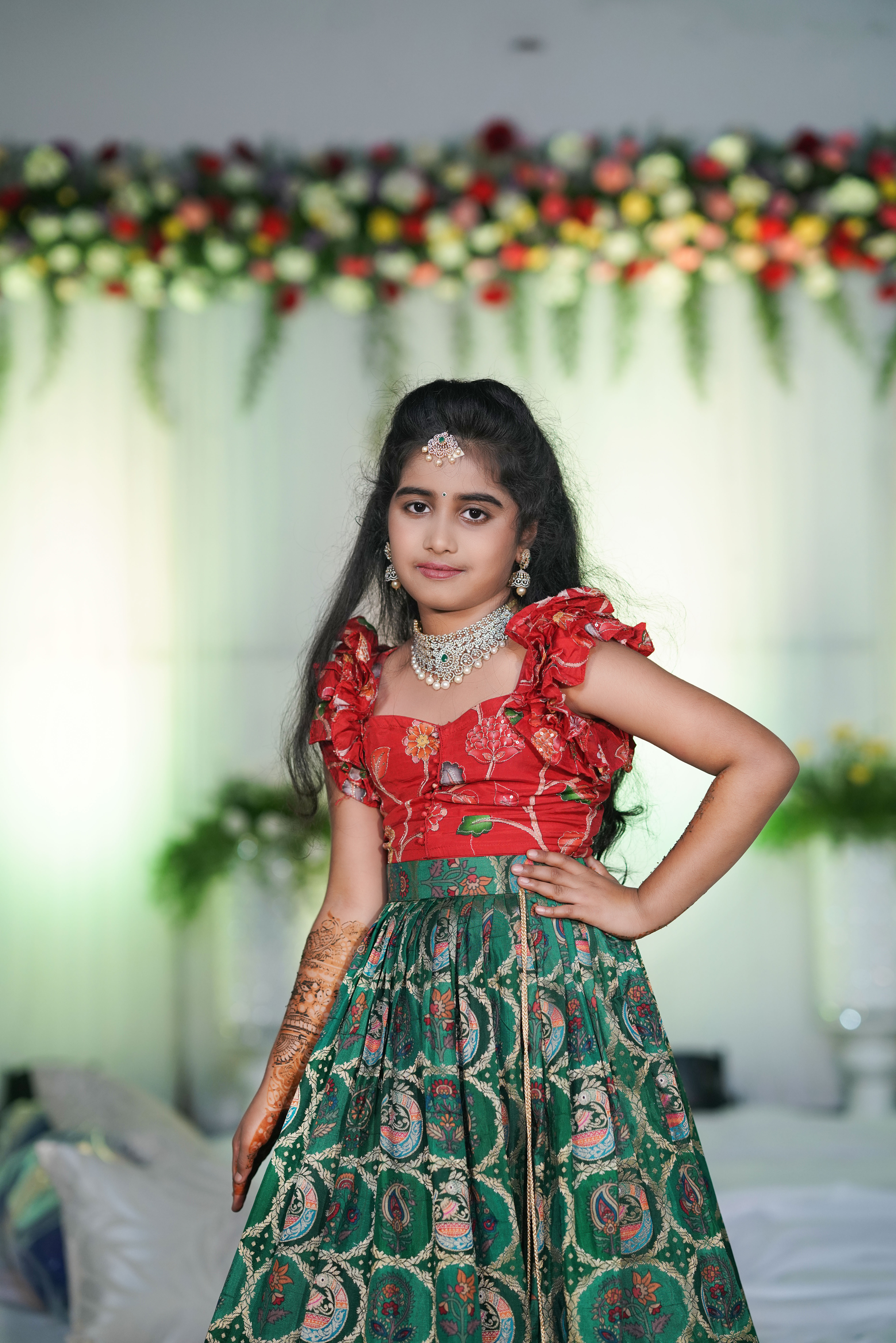 Several glowing blue jellyfish swim in dark water.