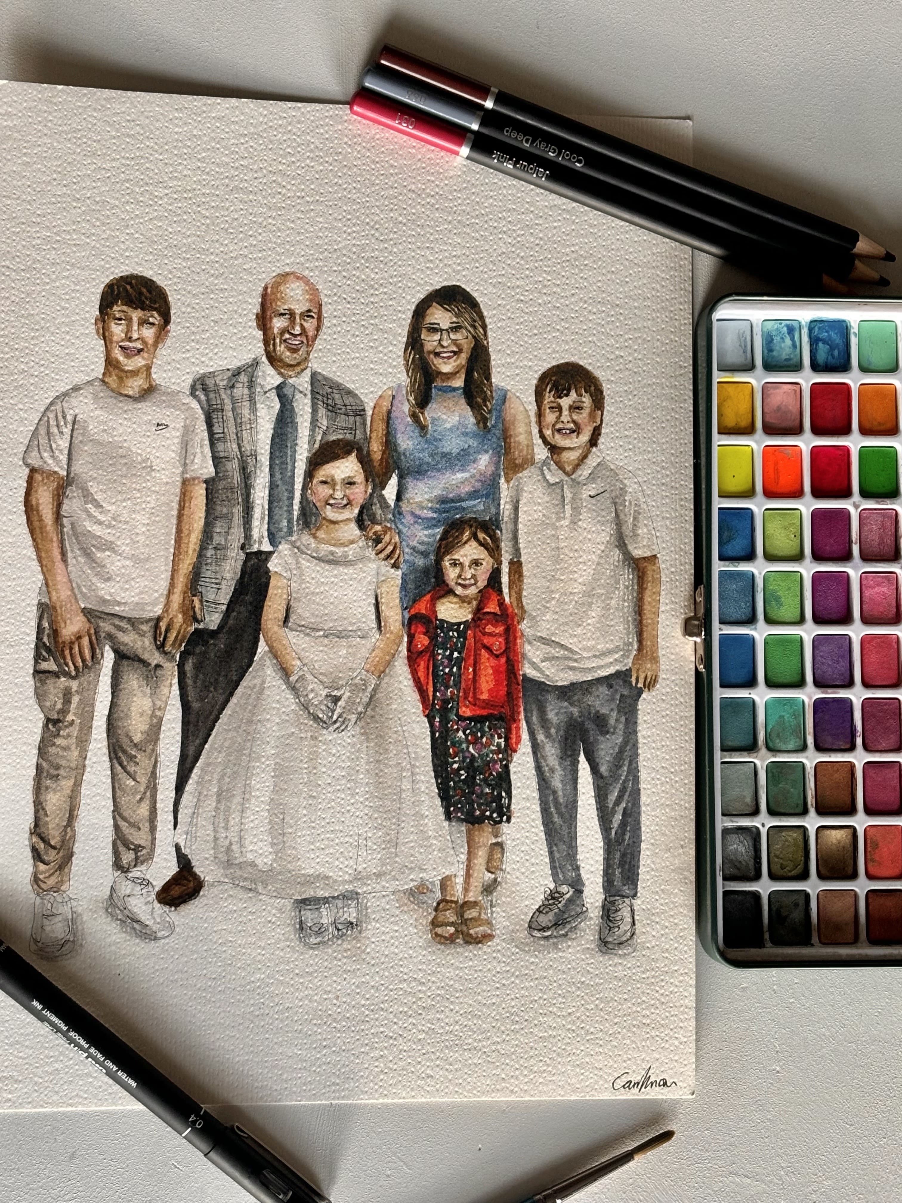 Full moon rising over a dark, silhouetted mountain ridge.