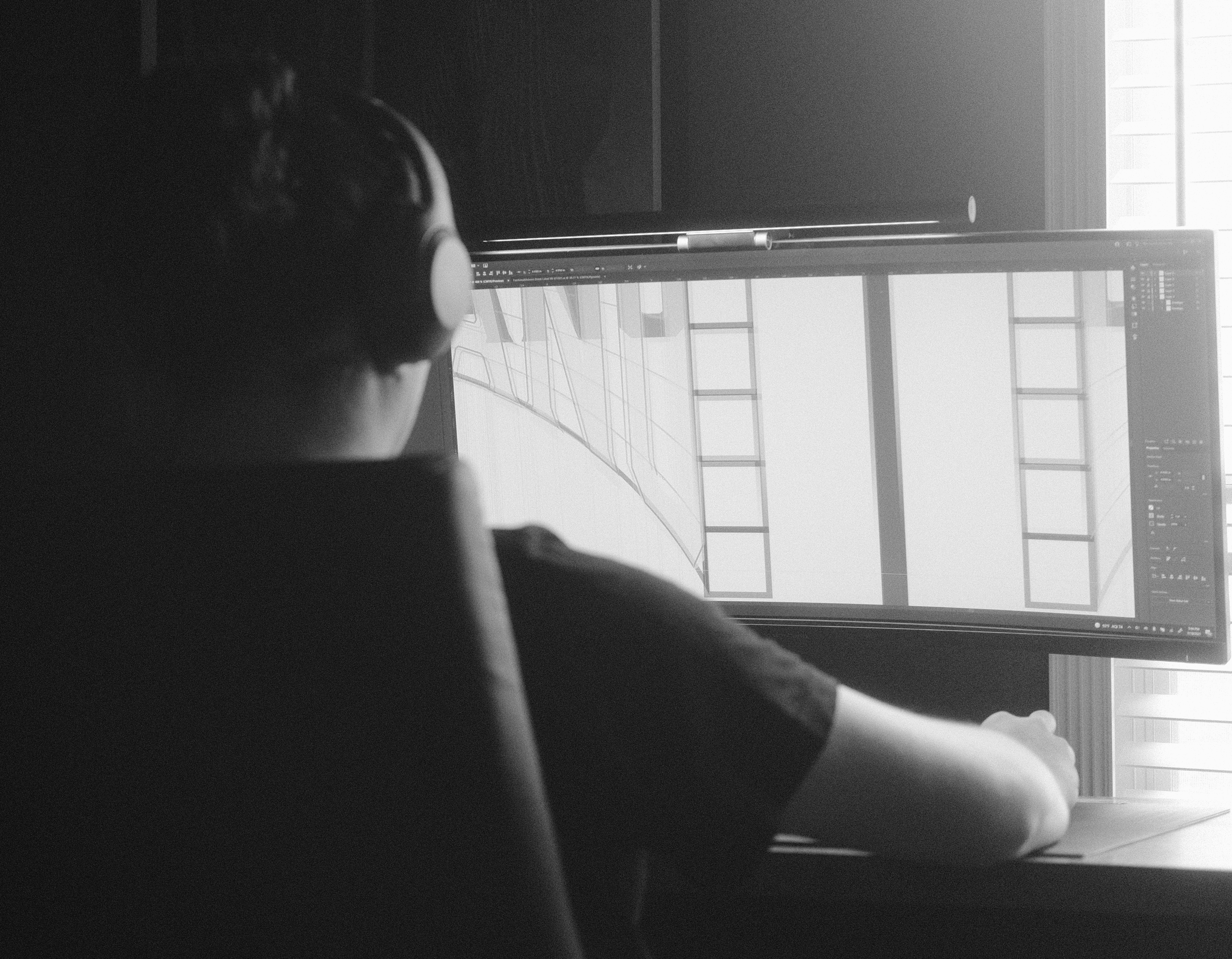 a blurry photo of a person standing in front of a wall