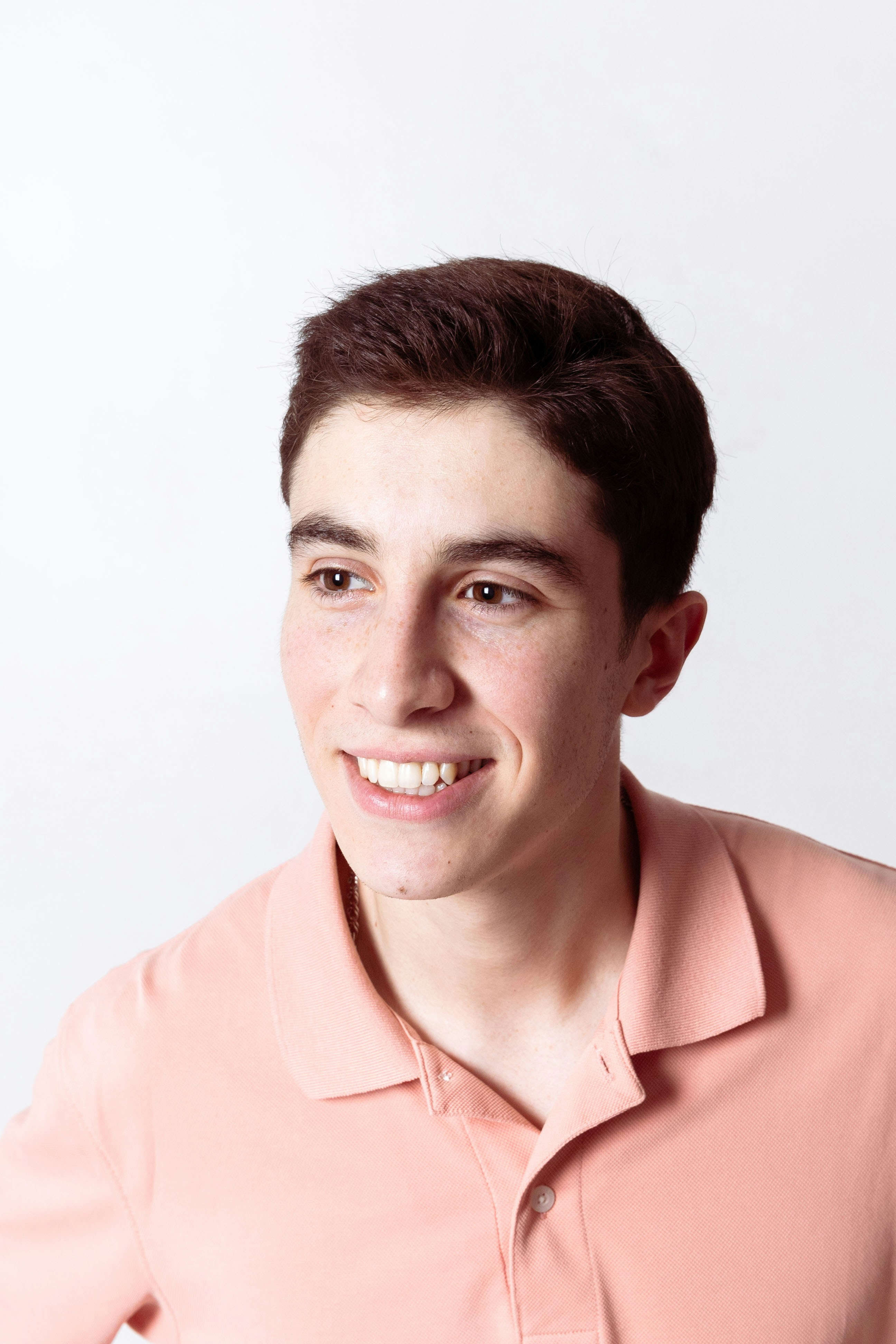 man in black collared shirt smiling