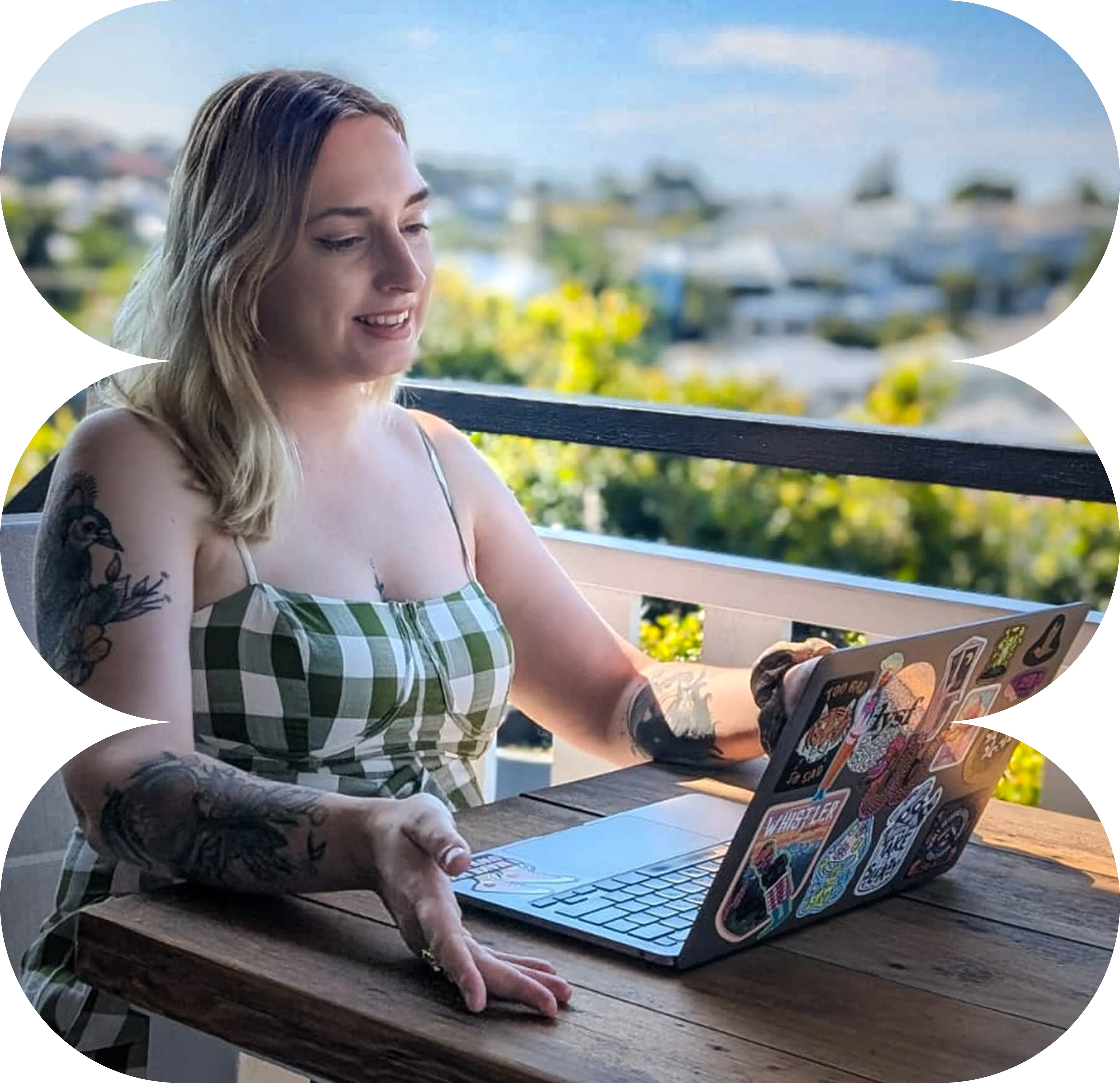 Jade smiling in casual tshirt with pink leafy background