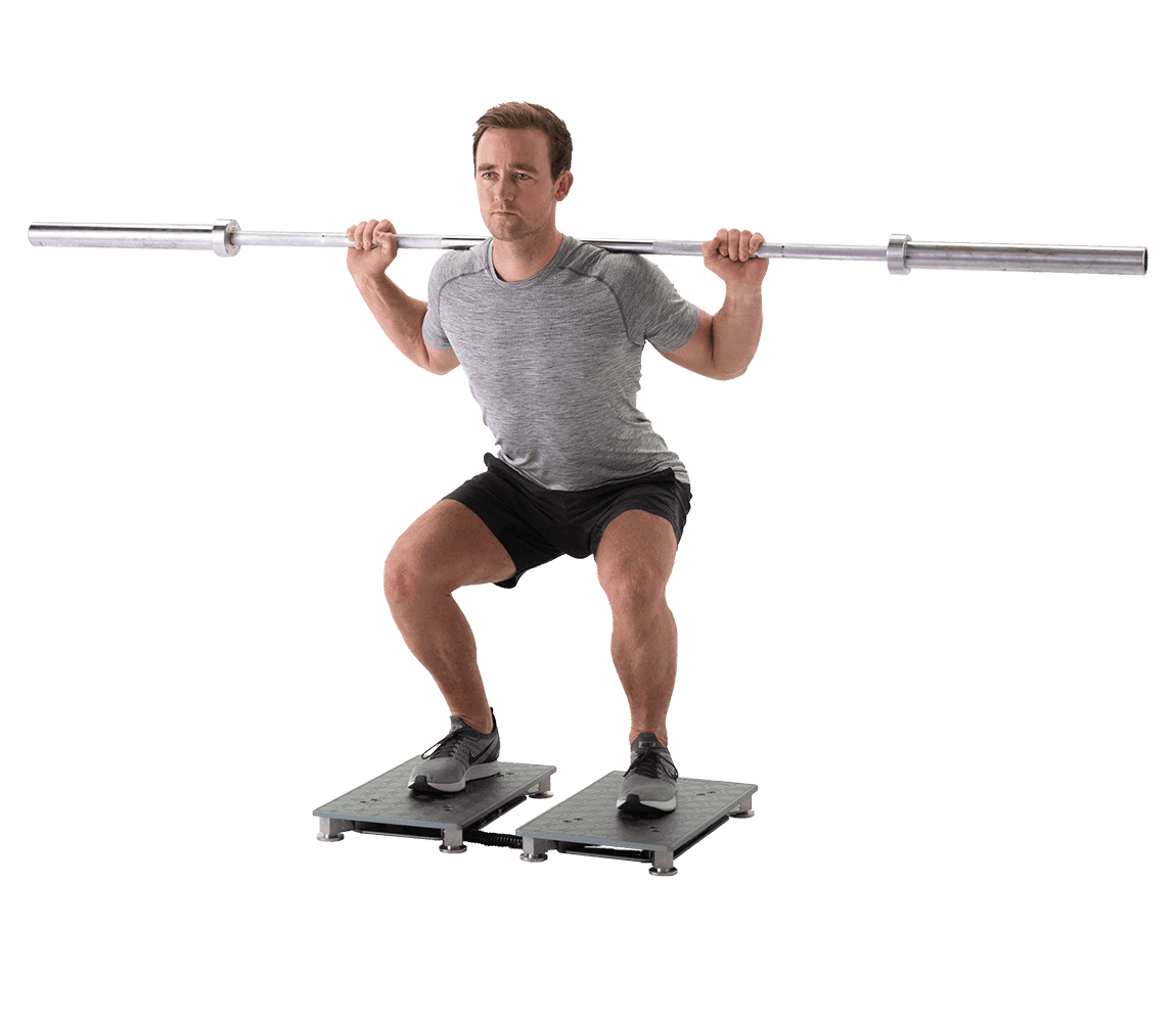 Bild eines Mannes der einen Squat auf zwei Kraftmessplatten macht