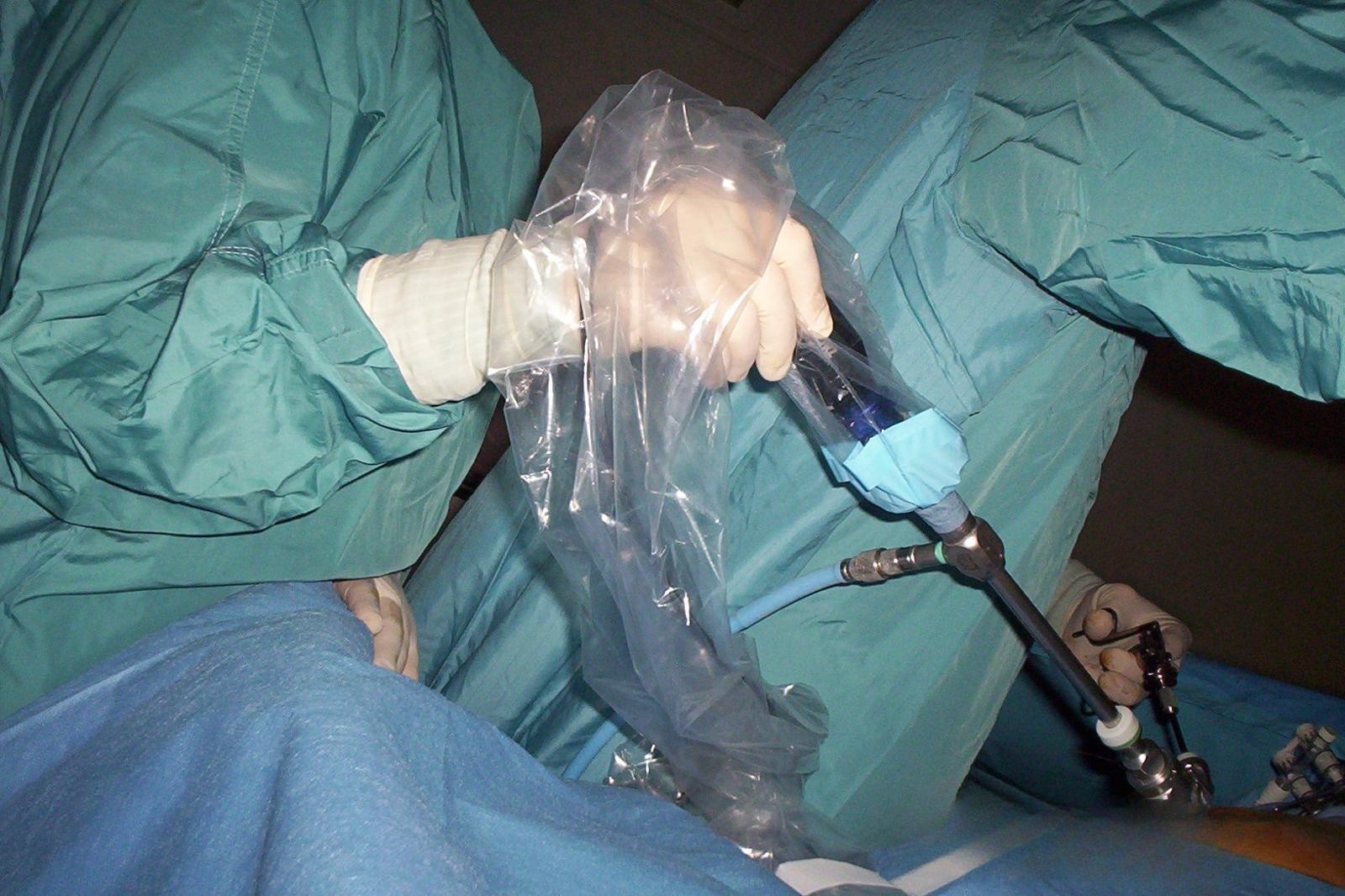 boy holding stock pot