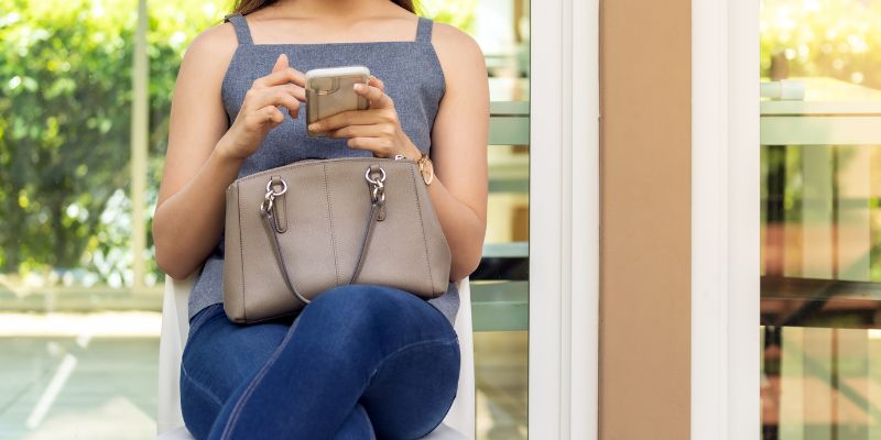 A customer waiting for a table in a restaurant