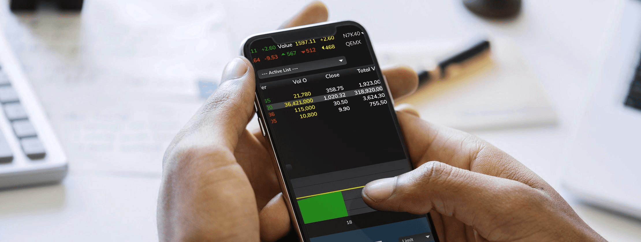 Person analyzing stock data on mobile device - BullX Alternative