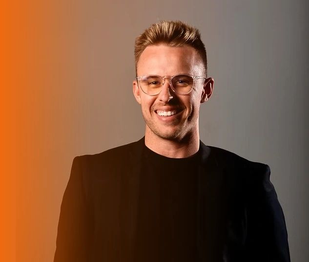 a black and white living room with a large tv