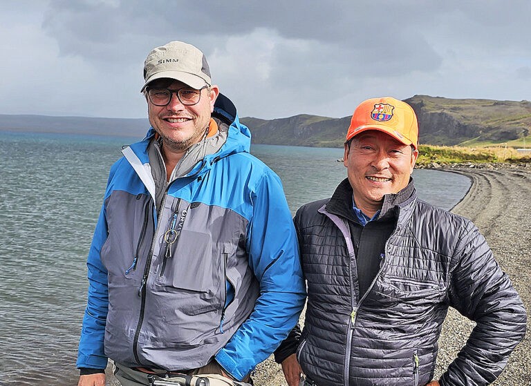 people sitting on chair in front of laptop computers
