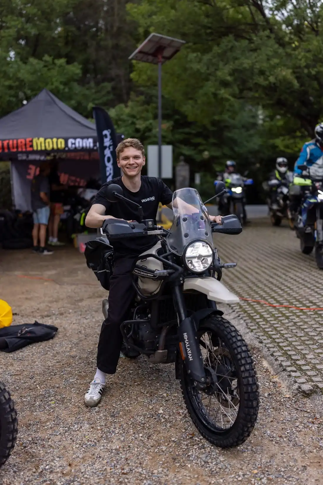 young man sitting on a bike