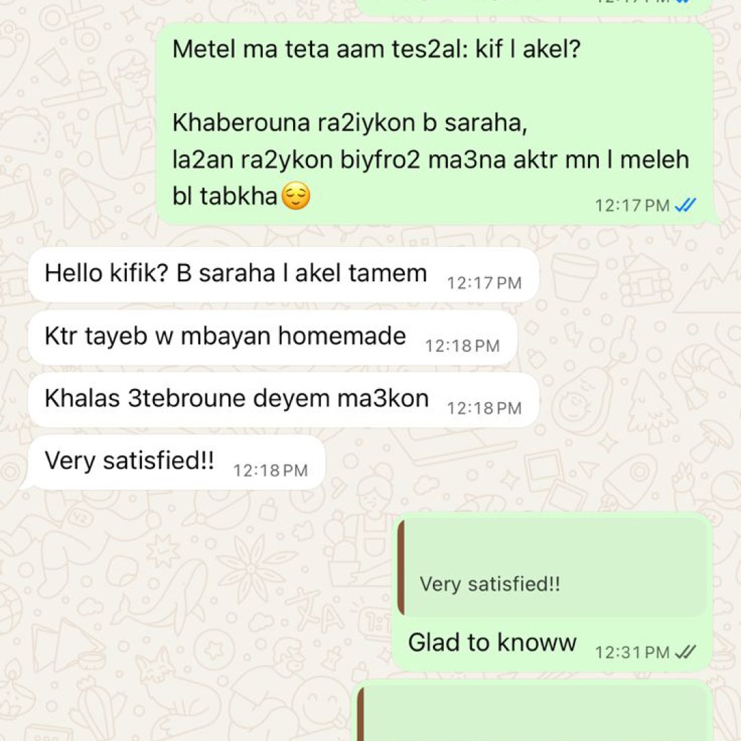 person writing on a piece of paper