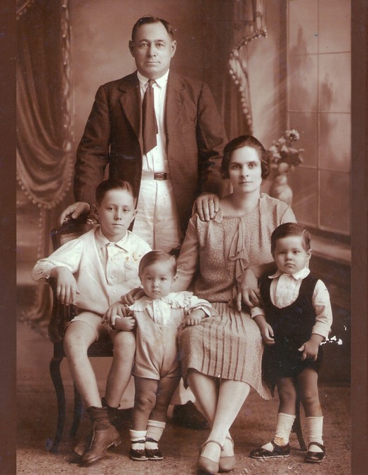 Juan and Dolores Ugarte with 3 children left to right_ paulino, Mario, Juan.jpg