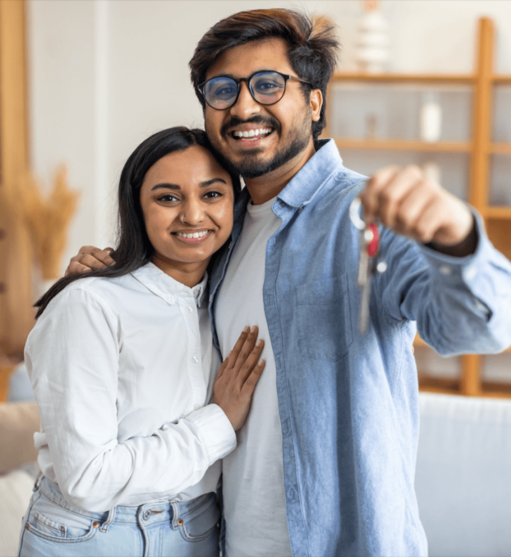 Happy Family Holding The House Key