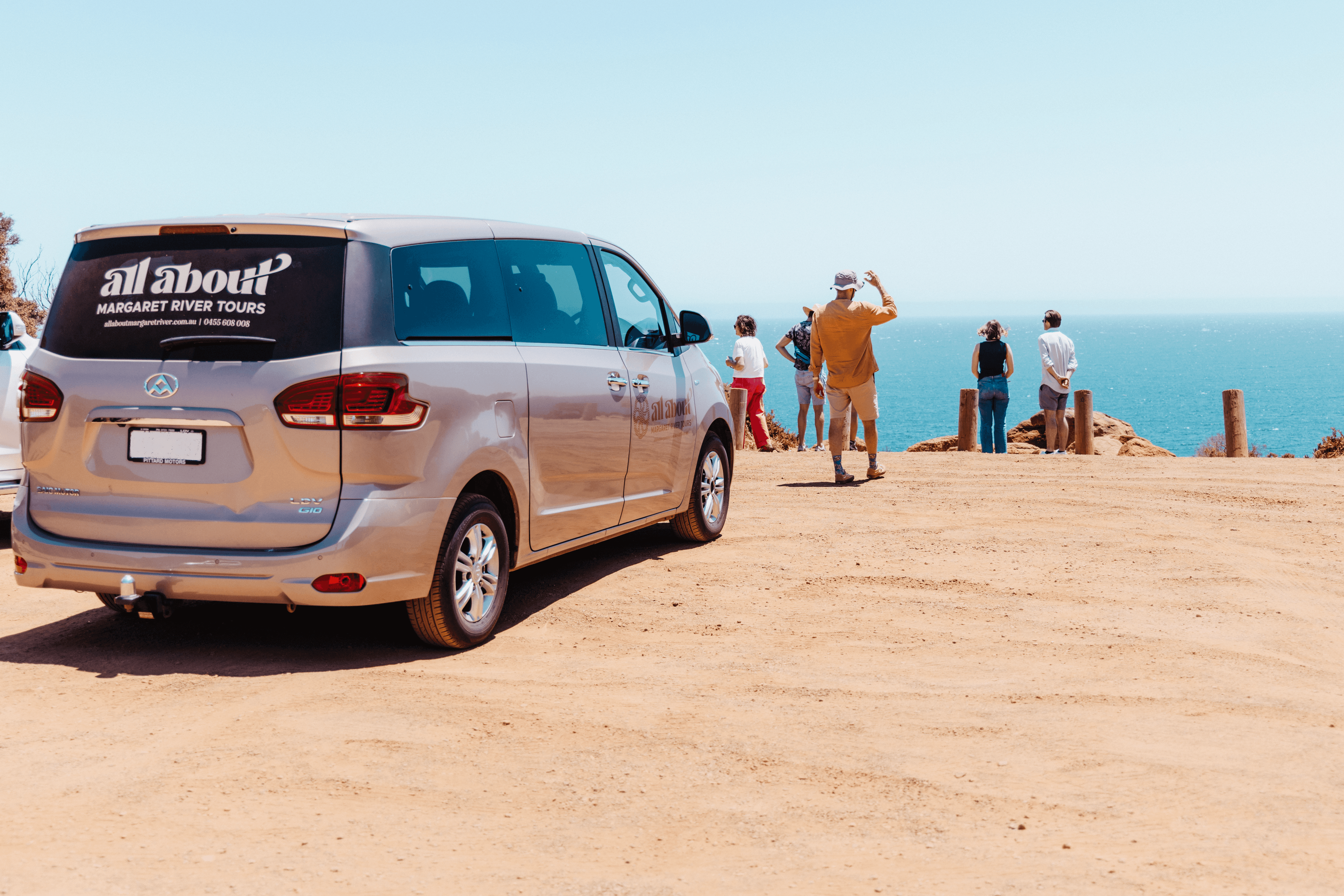 Tour Private Vehicle parked in front of the coast