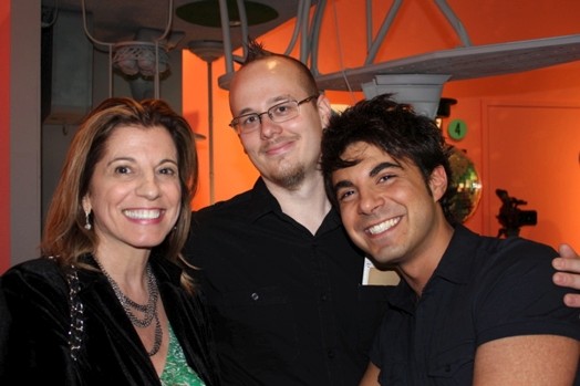 group photo of two men and a woman