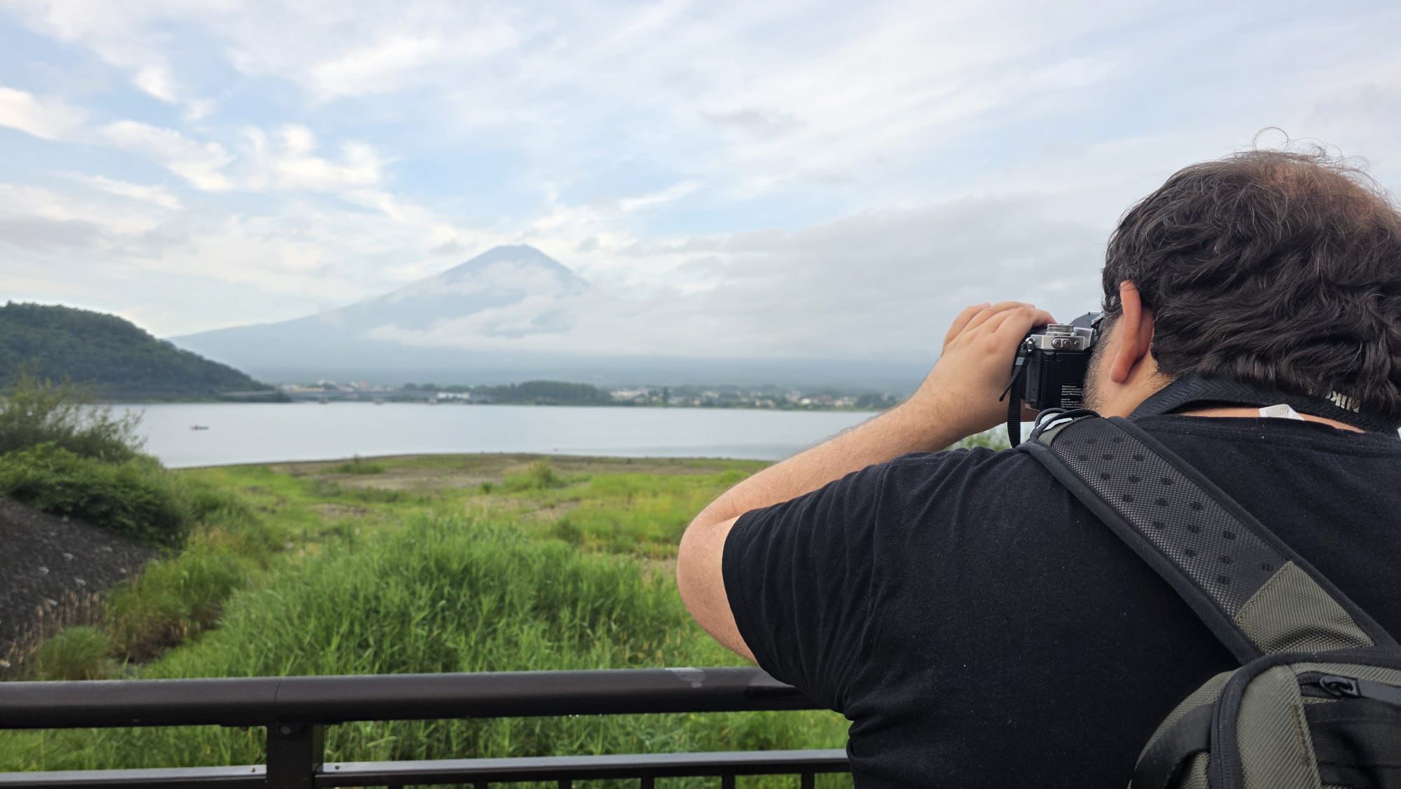 Oliver taking a photo with his Nikon ZFC at Lake Kawaguchi