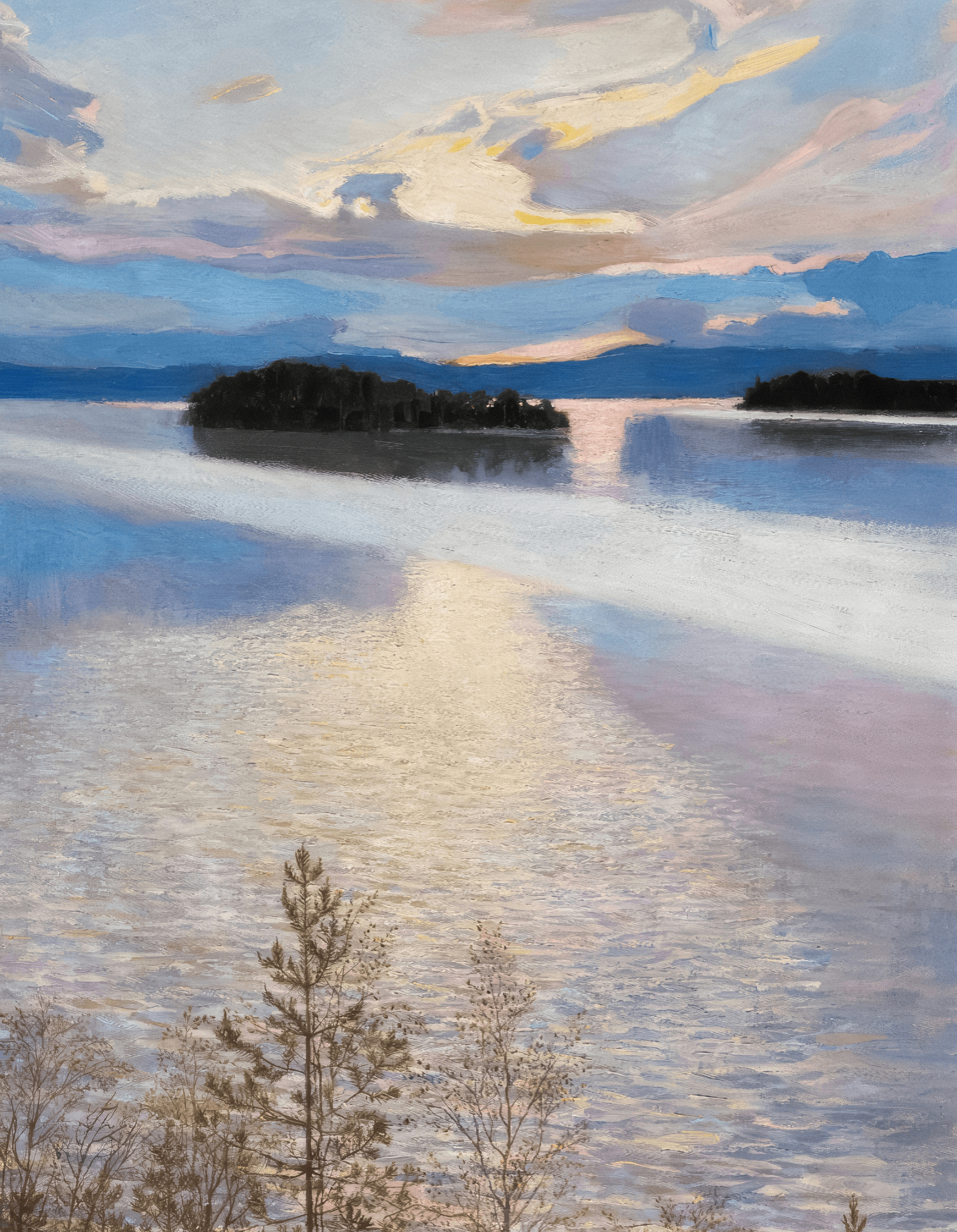 Sunset over a calm lake with islands