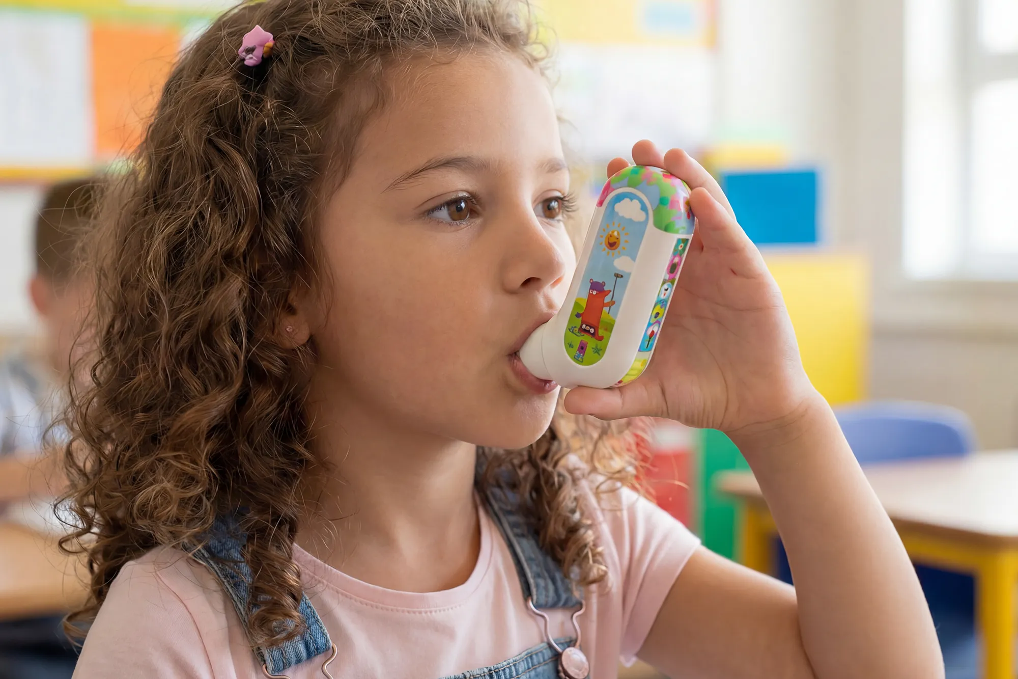 Streetside billboard with flyposters of the Batch.Works brand and illustrations