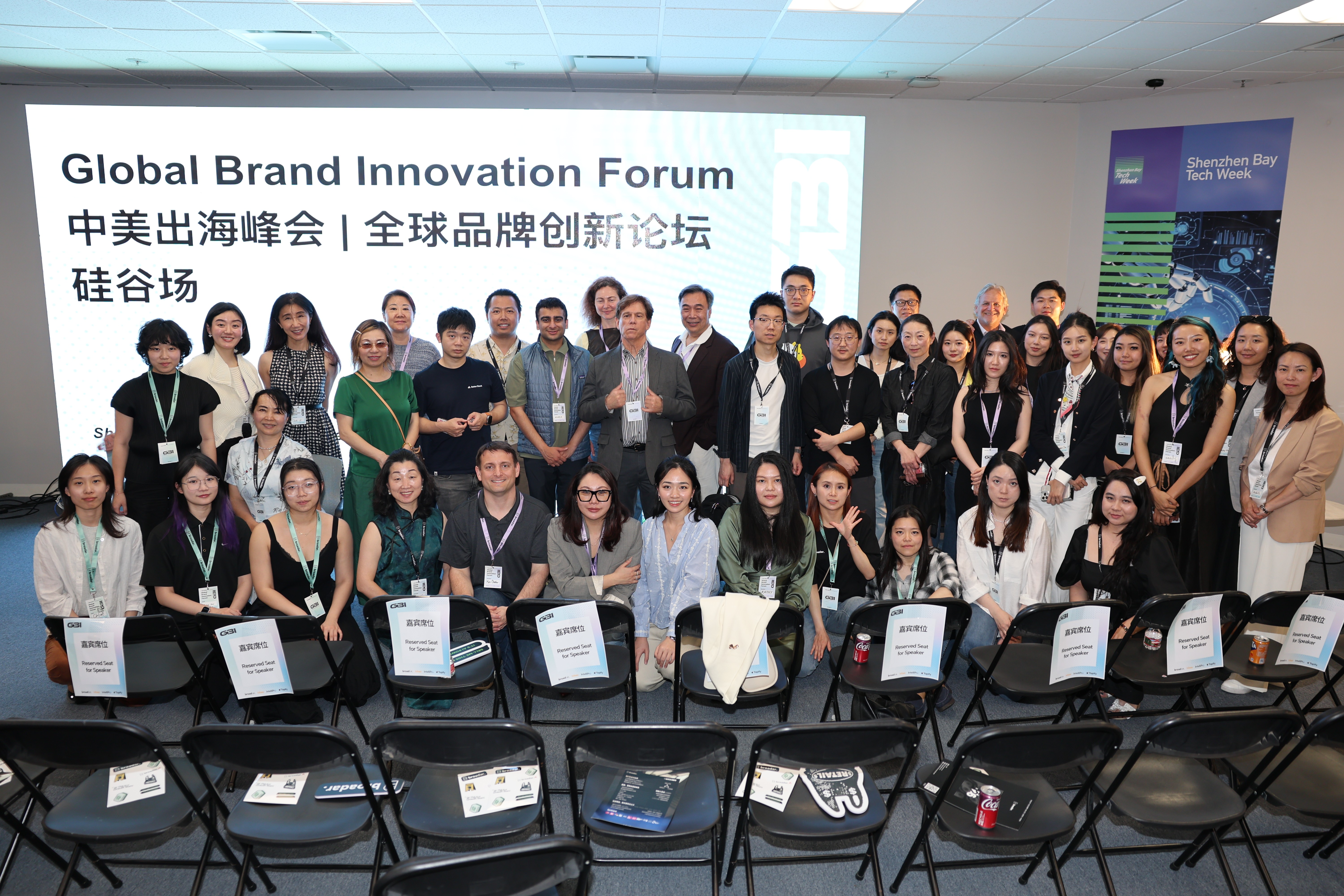 Three children jumping in burlap sacks during a race.