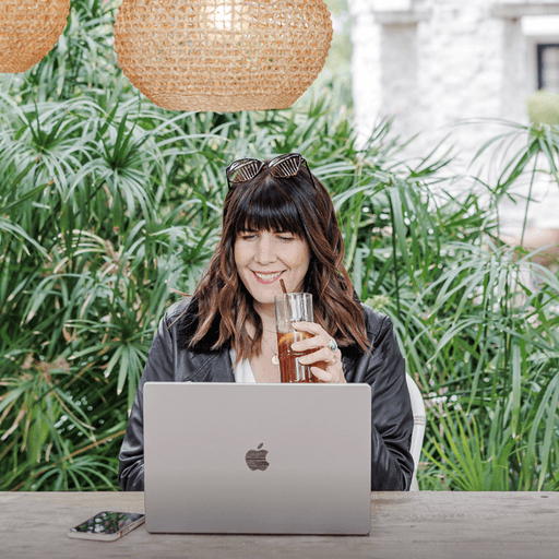 Jeni of Marvelous working at Laptop