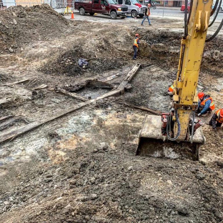 excavator digging at site
