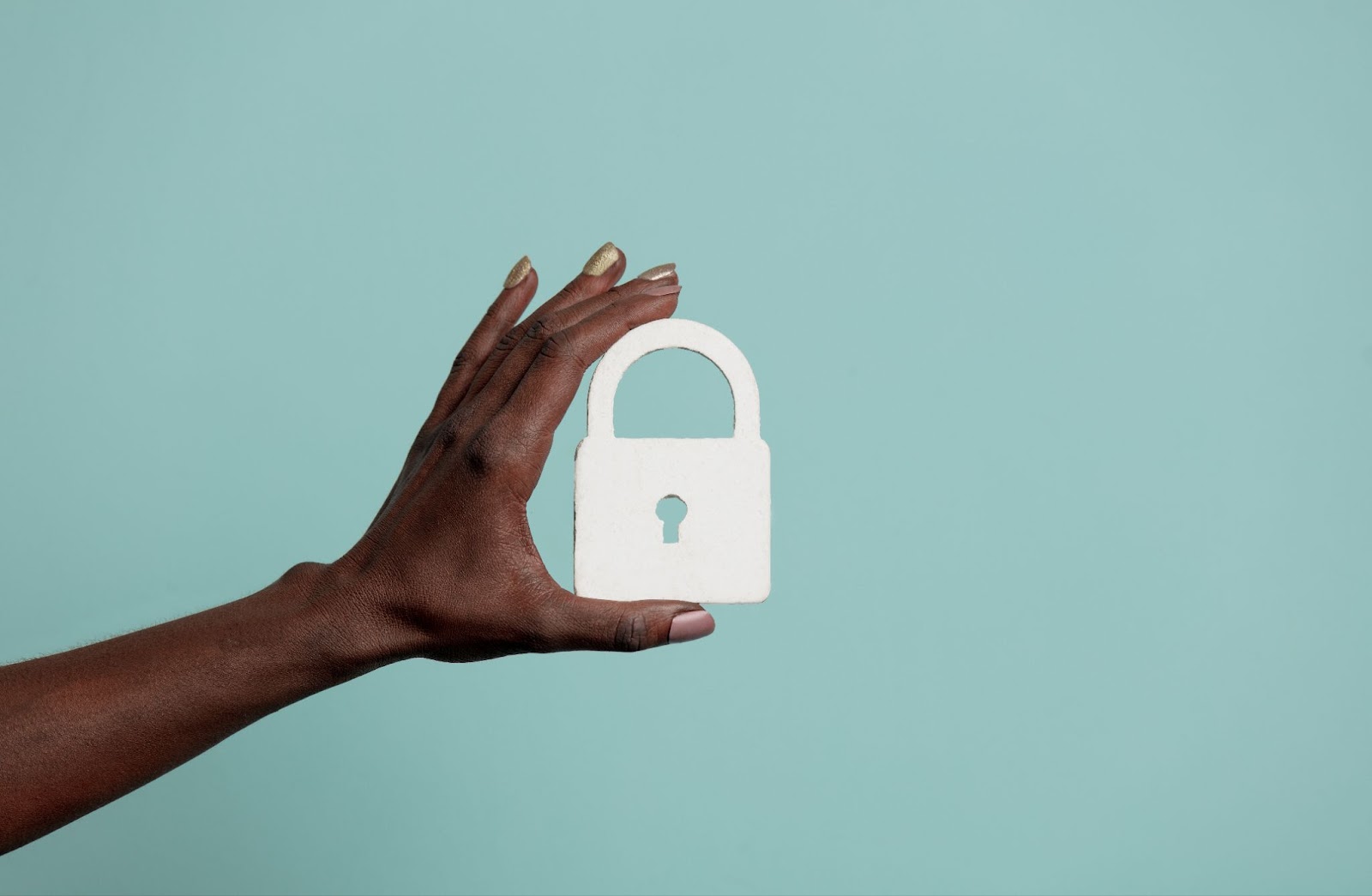 Woman holding a lock symbol. 