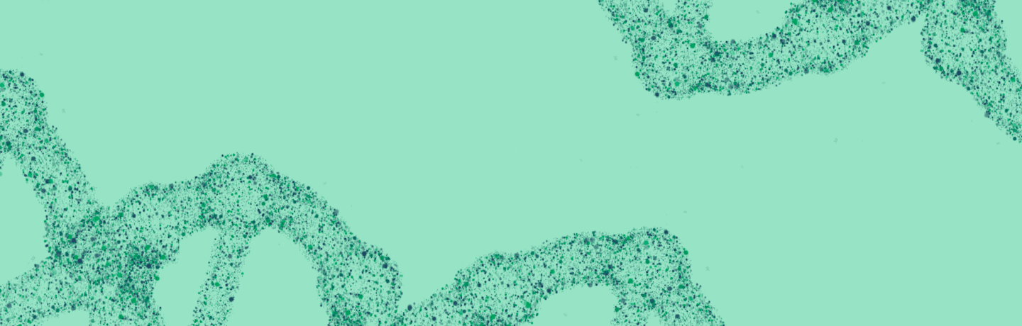 Teal background with green and blue speckled organic shapes.