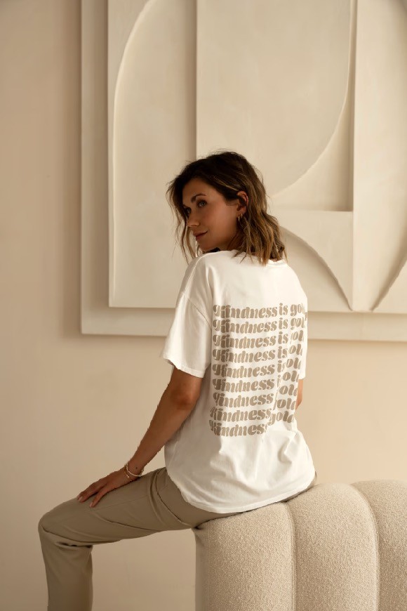 T-shirt with stacked text "Kindness is gold"