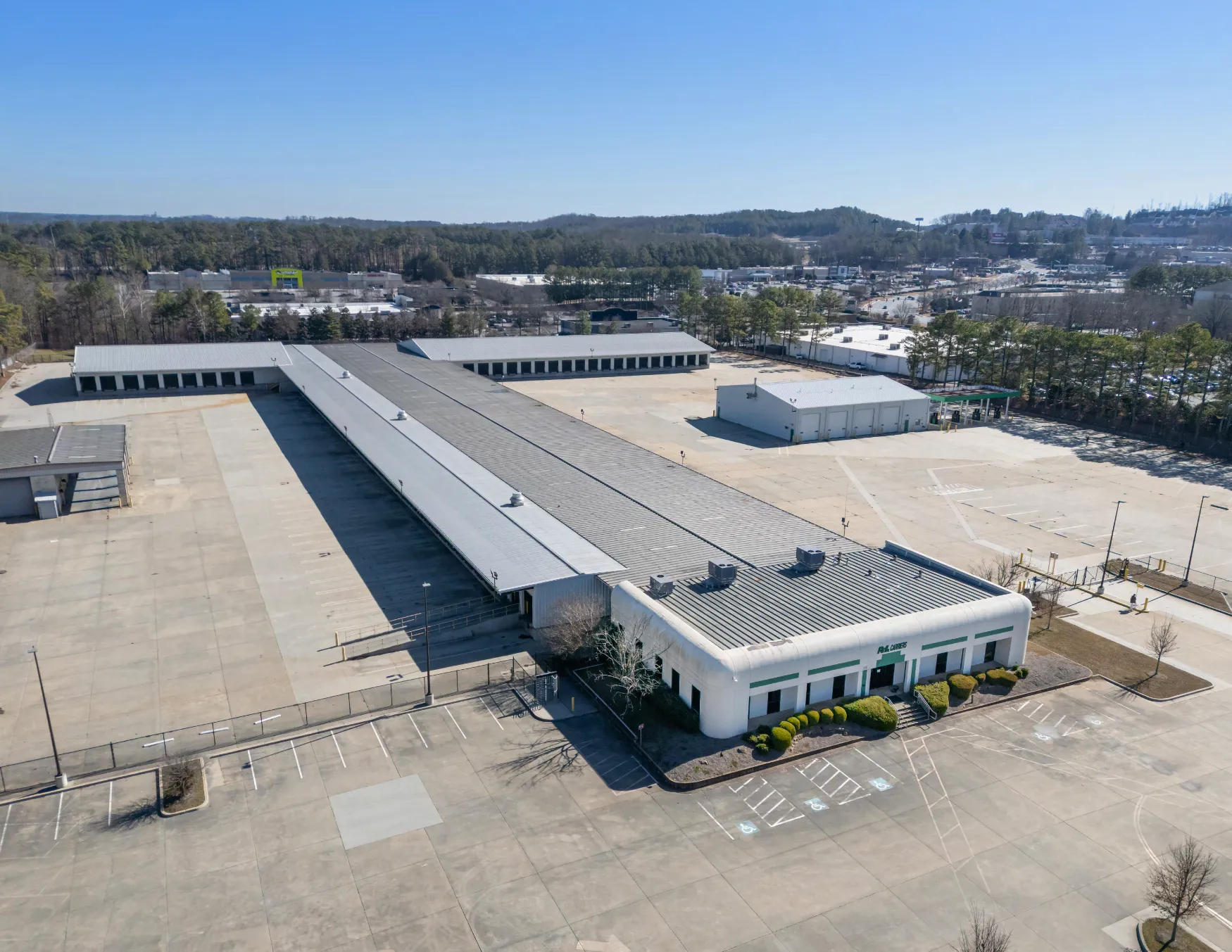 Aerial view of the industrial outdoor storage site at 2400 Barrett Lakes Boulevard (R&L Terminal Portfolio), Kennesaw, GA