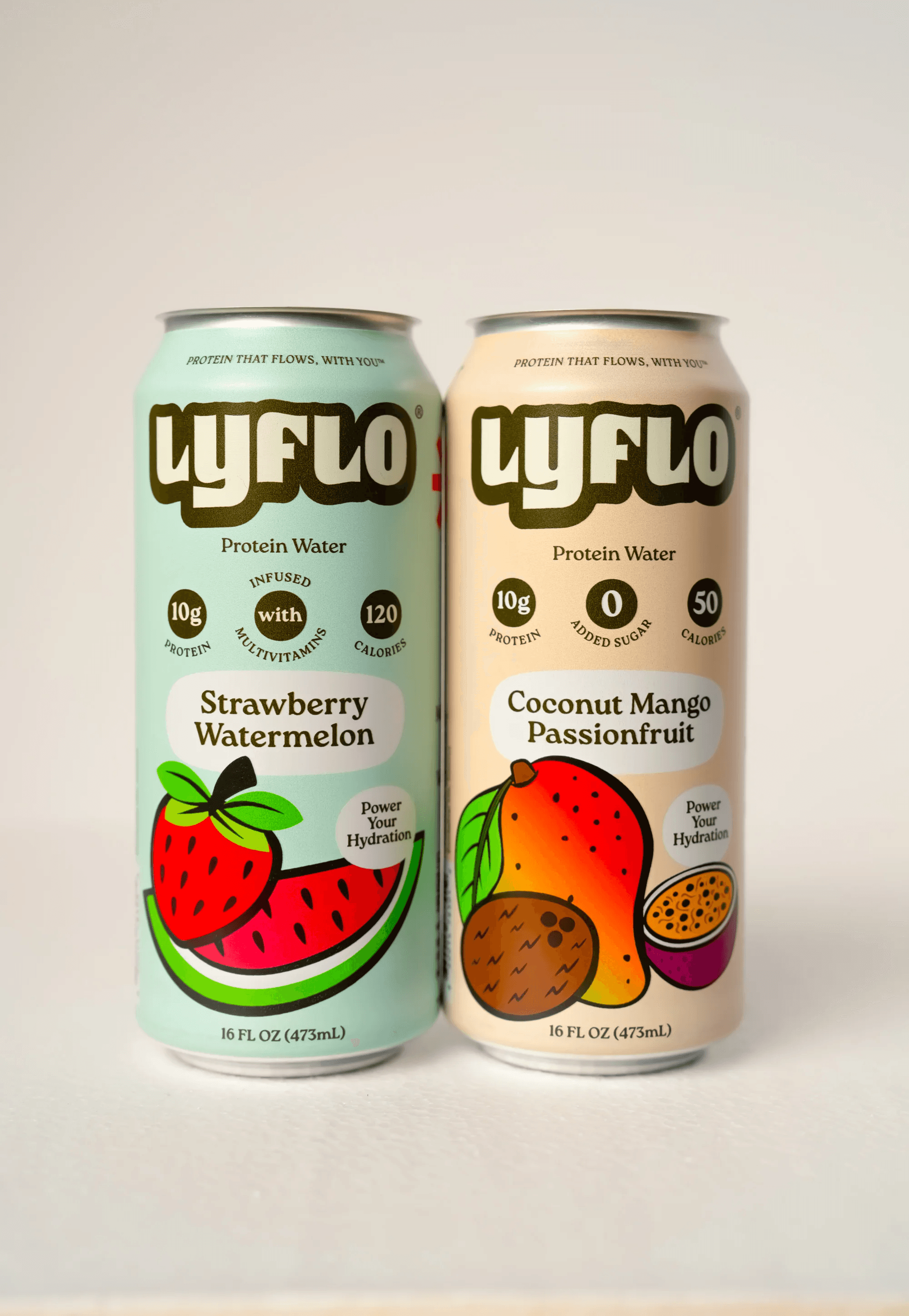 Two cans of fruity flavored protein water sitting next to each other