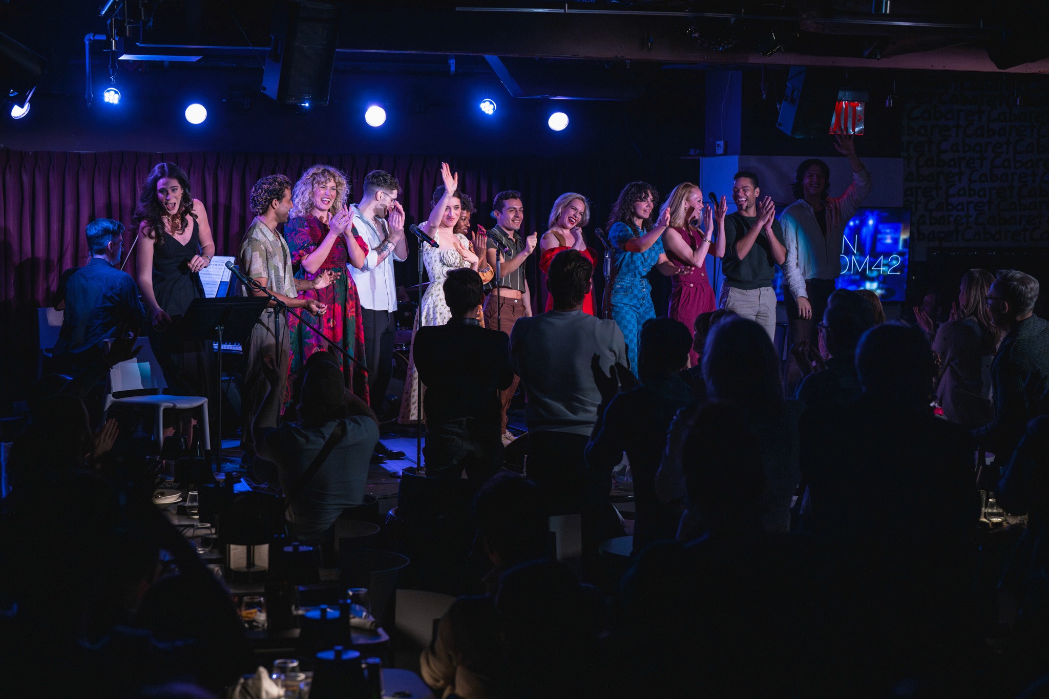 The company of The Goose Girl taking a bow before the audience at a developmental concert presentation.