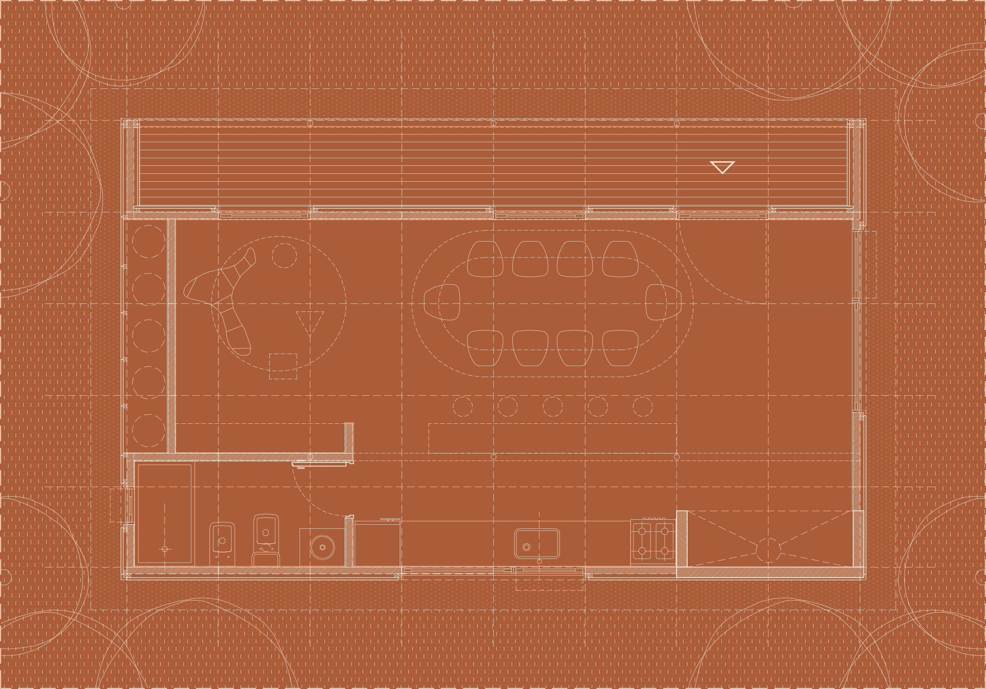 Person sitting in a modern office in front of a wall covered with notes and sketches.