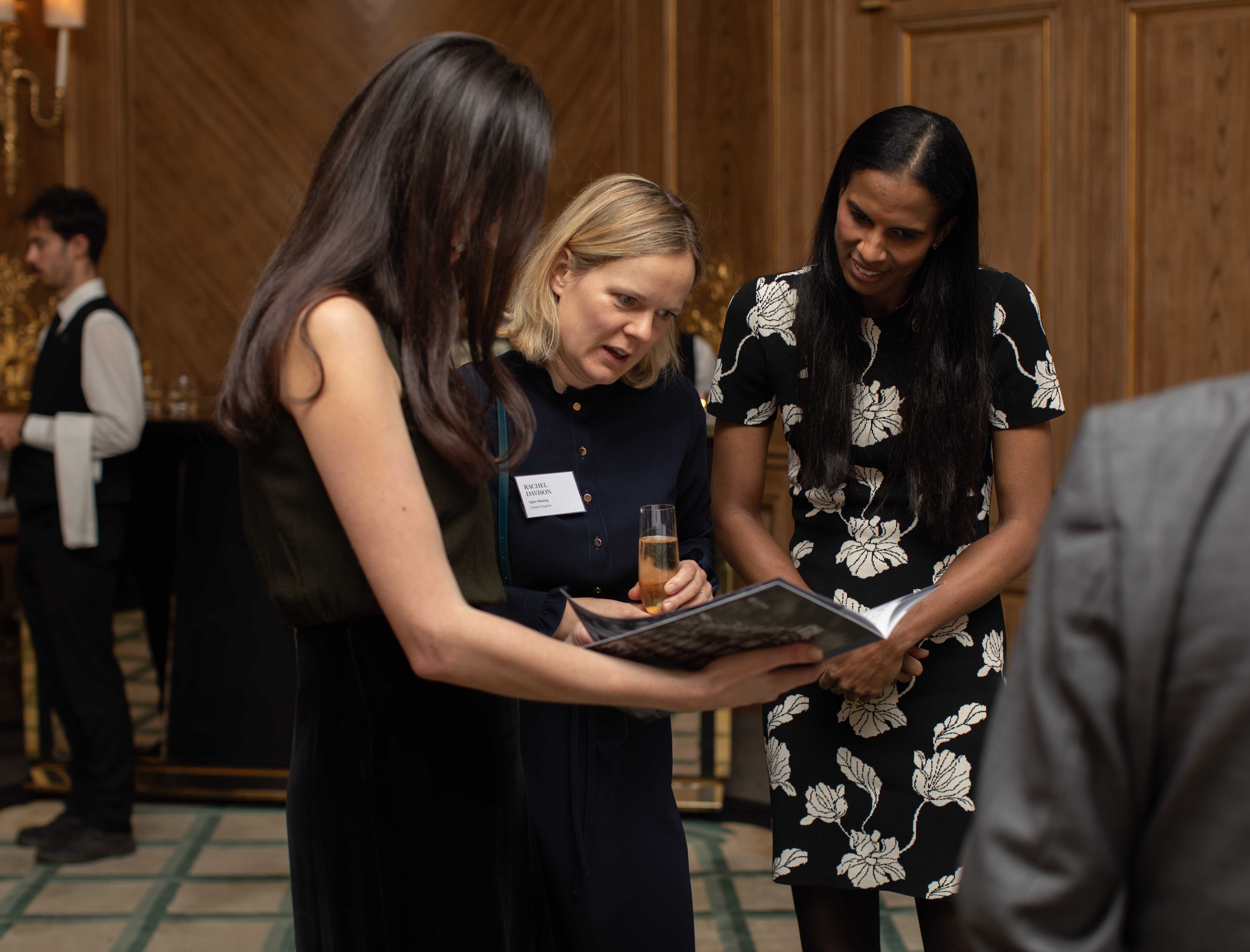 Members of the ITPA discussing one of the presentations of the vent