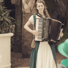 Lucy performing at a wedding