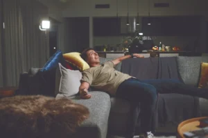 Scene from the 2020 MyPlace campaign featuring comedian Arj Barker as the face of ‘Australian Smarts,’ highlighting the brand’s tech-focused messaging.