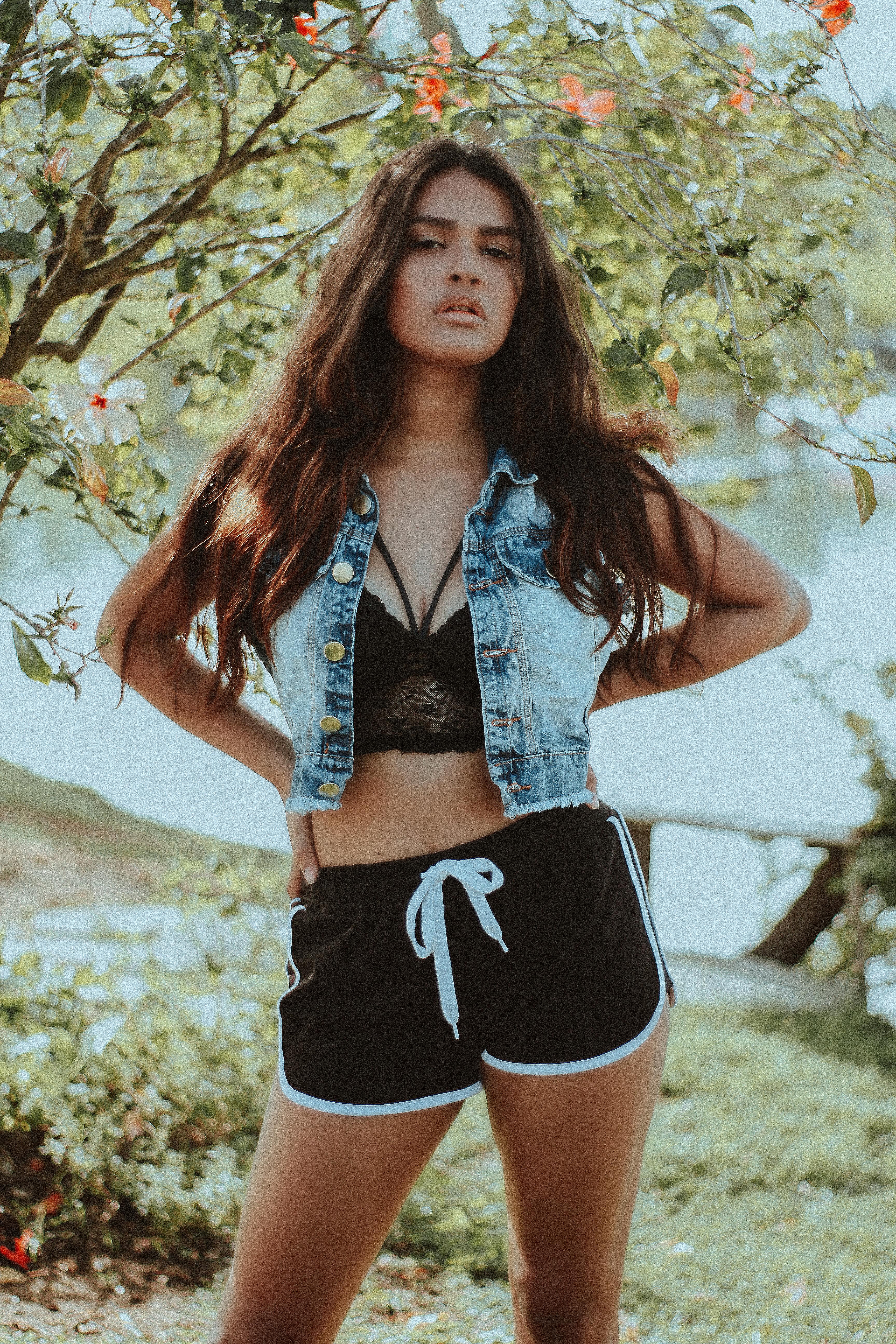kids lying on a glass land and smiling