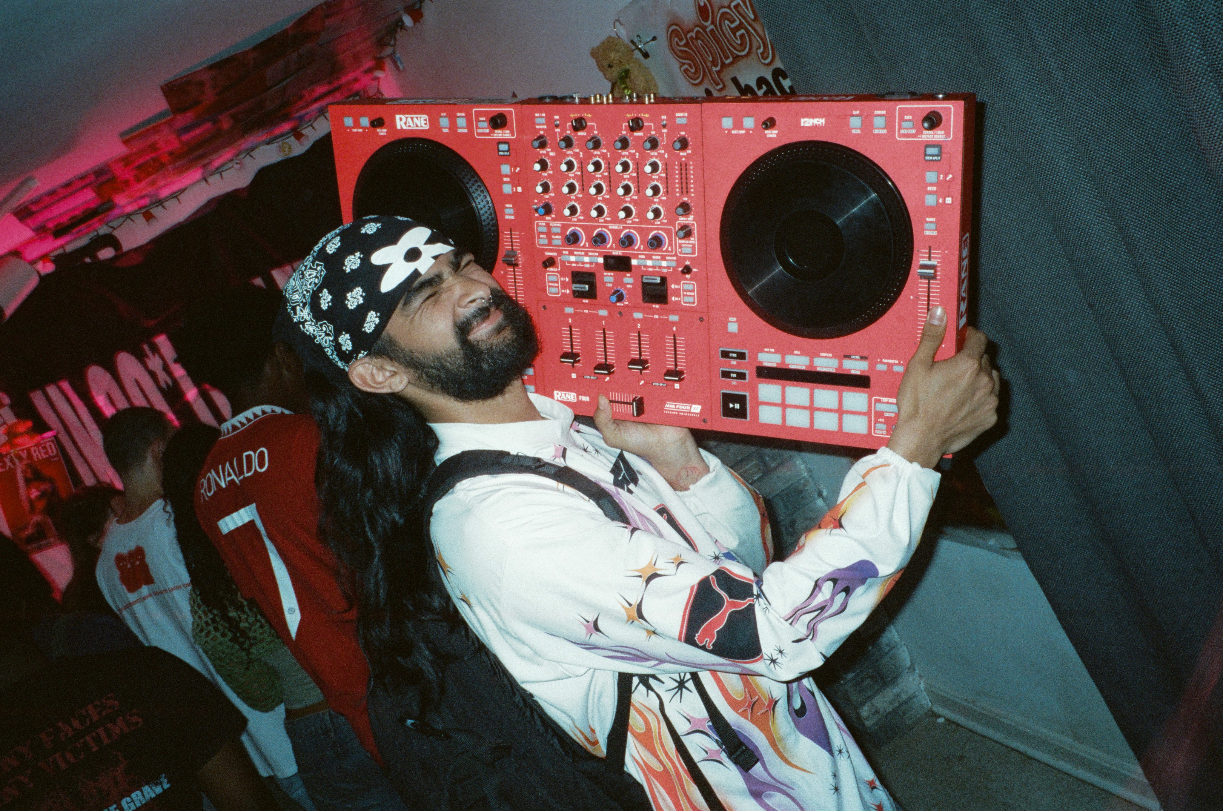 Spinning disc of man holding boombox