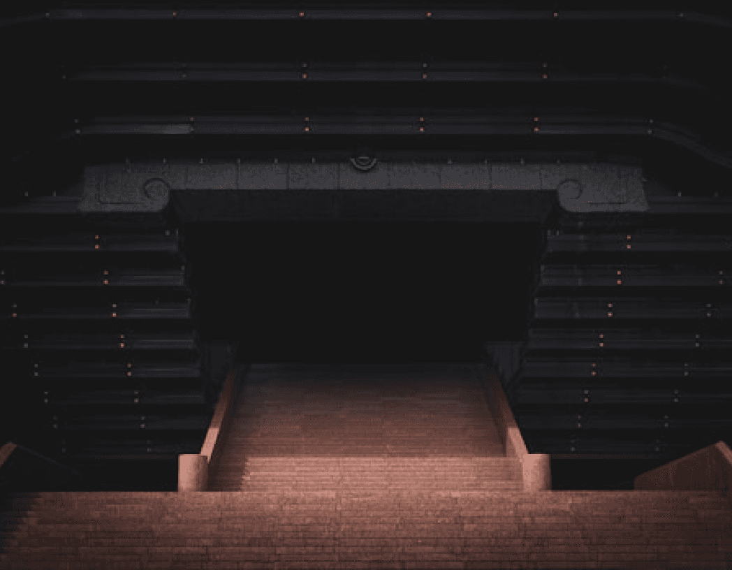 Stone steps leading into a dark, massive archway