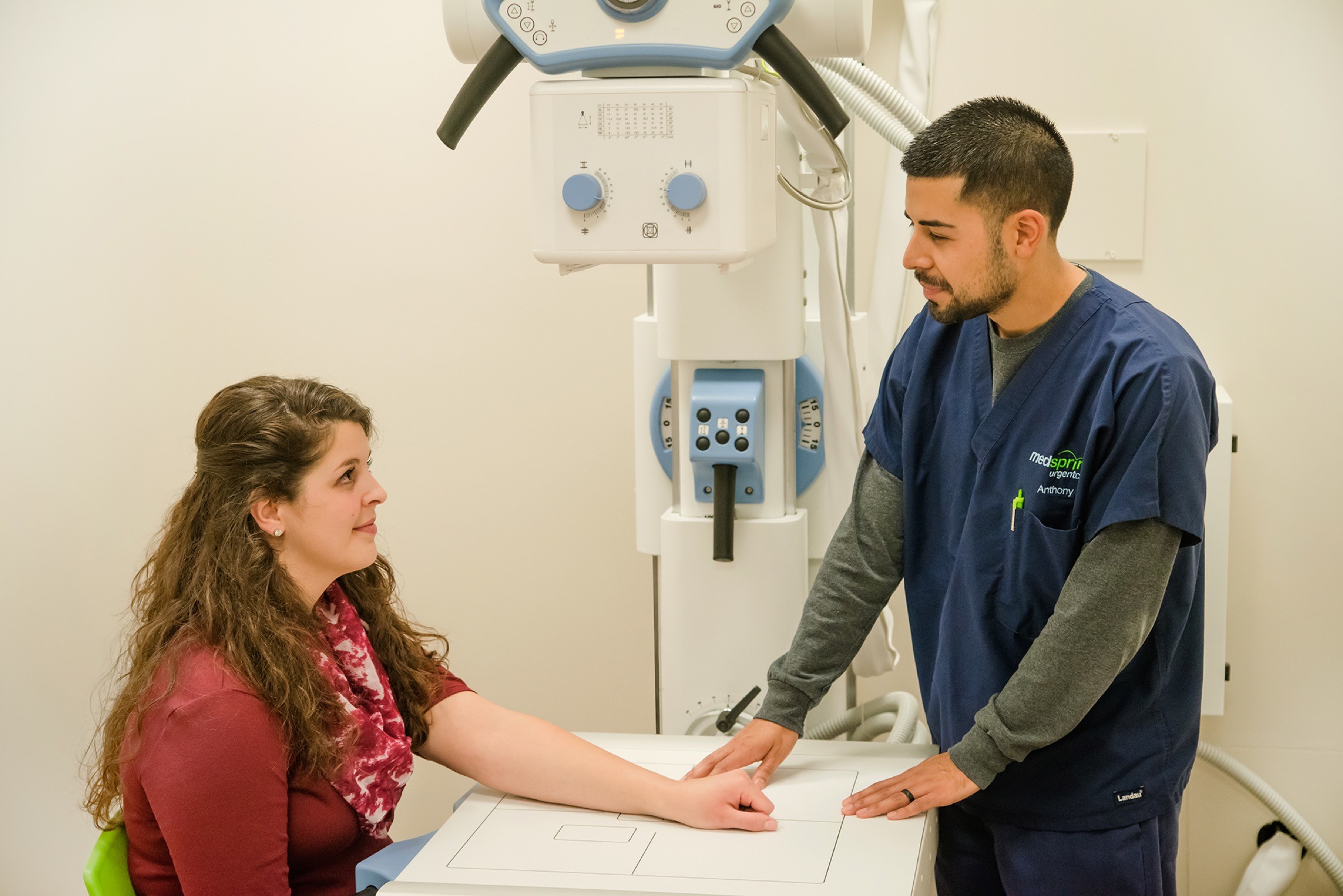 Medical professional speaking with a patient