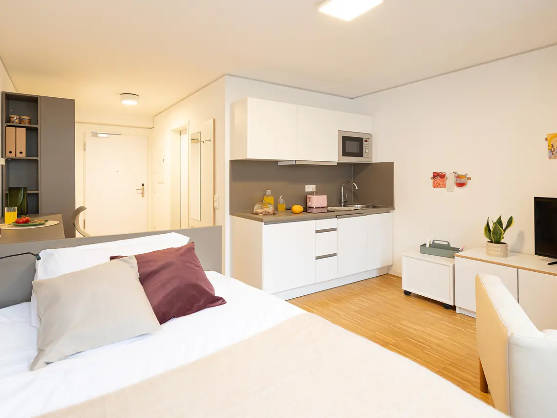 Modern private student studio in Frankfurt with bed, kitchenette and study space
