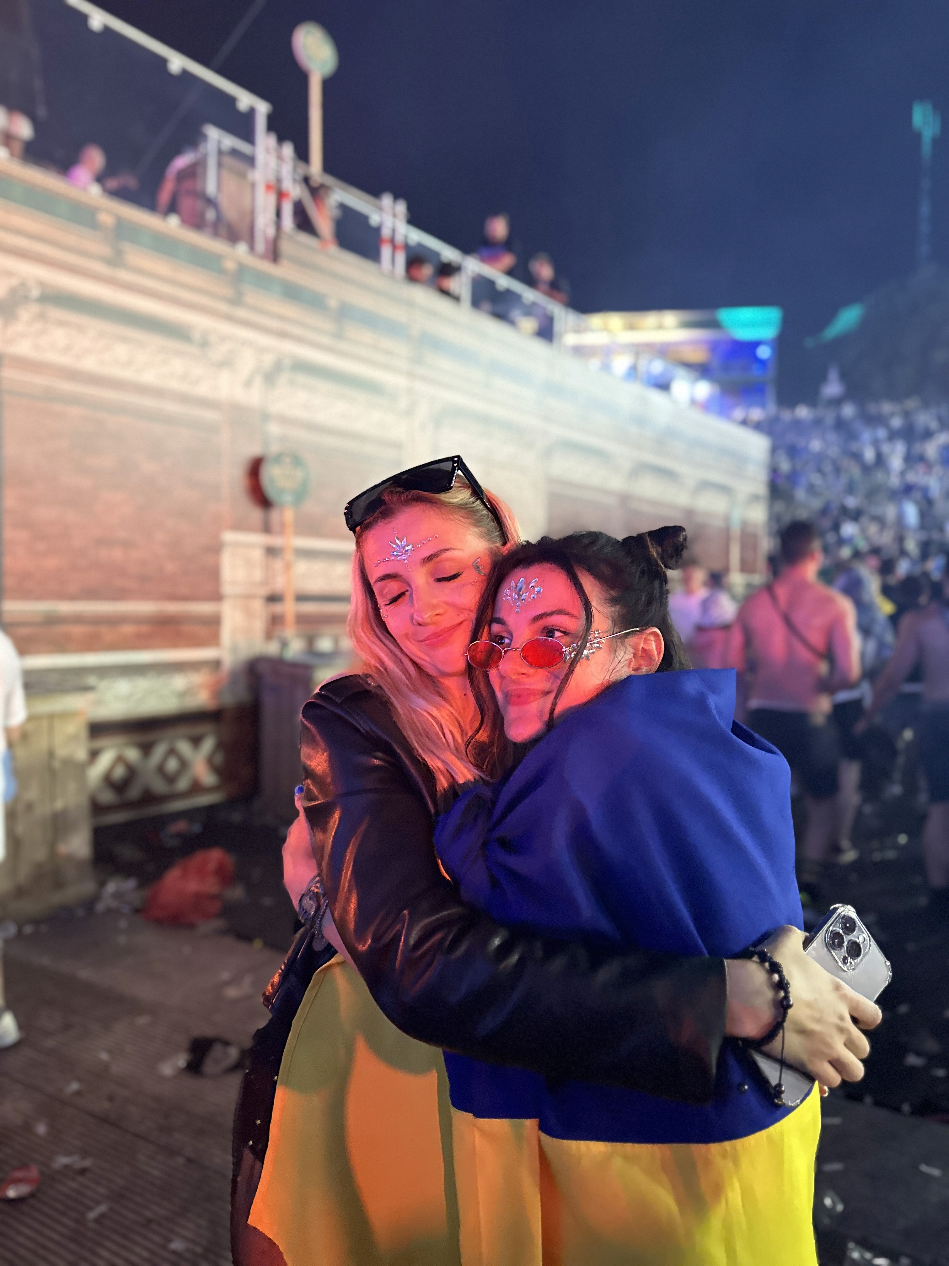 architectural photo of tower between buildings