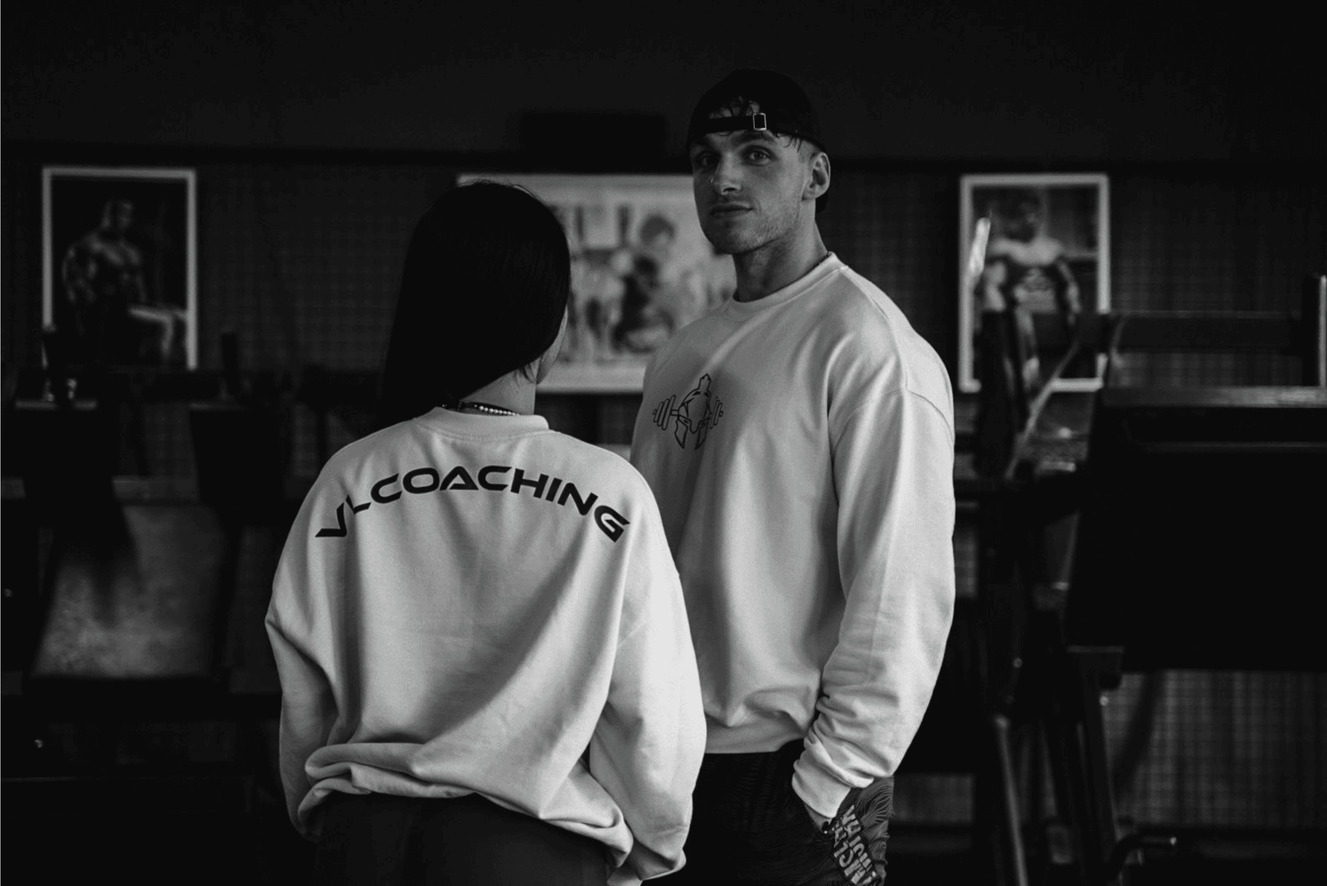 woman in black tank top and red shorts doing exercise