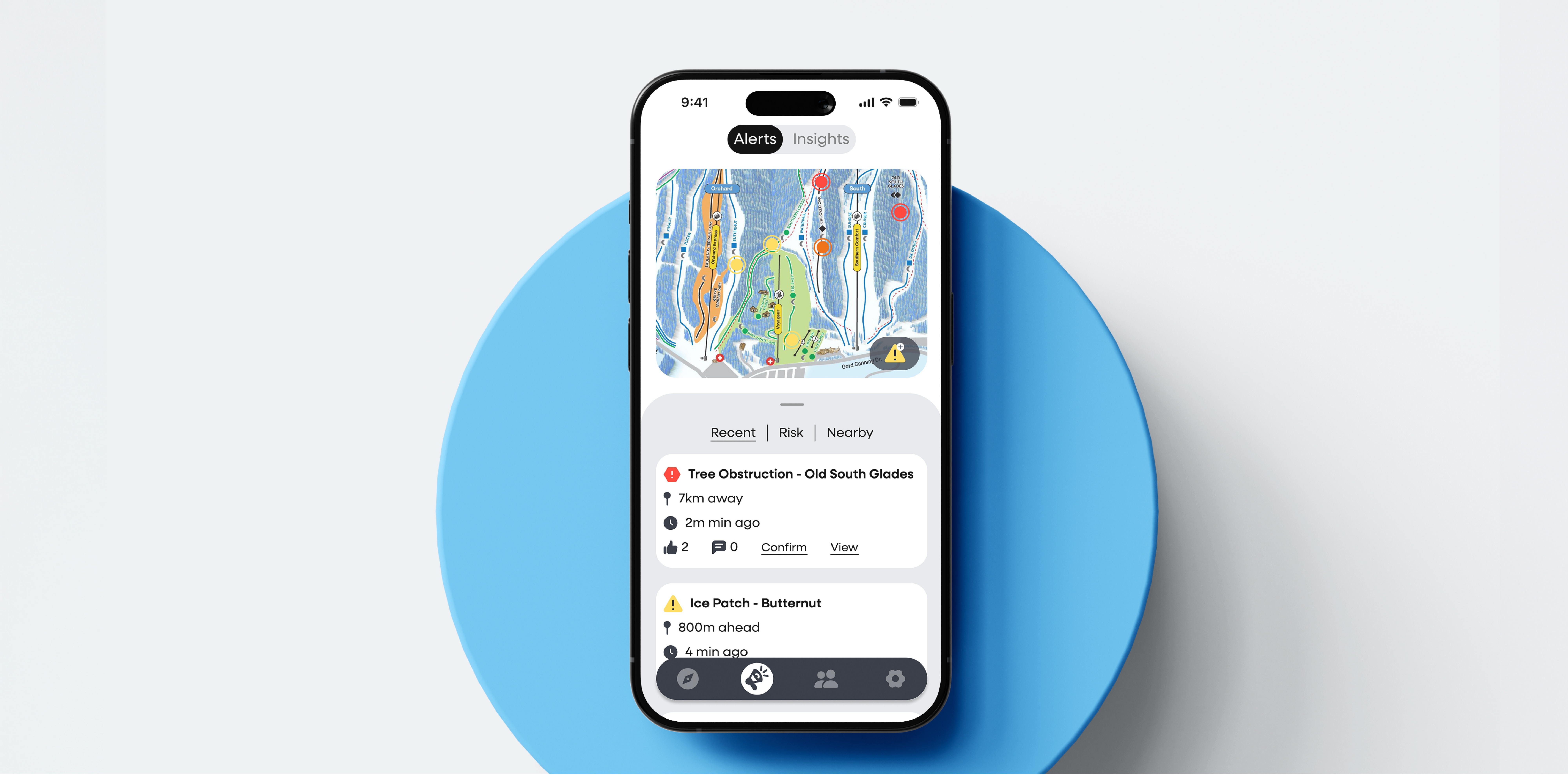 Floating smartphone mockup displaying a mountain‑safety app welcome screen with snowy ski‑lift background and sign‑up/sign‑in buttons.