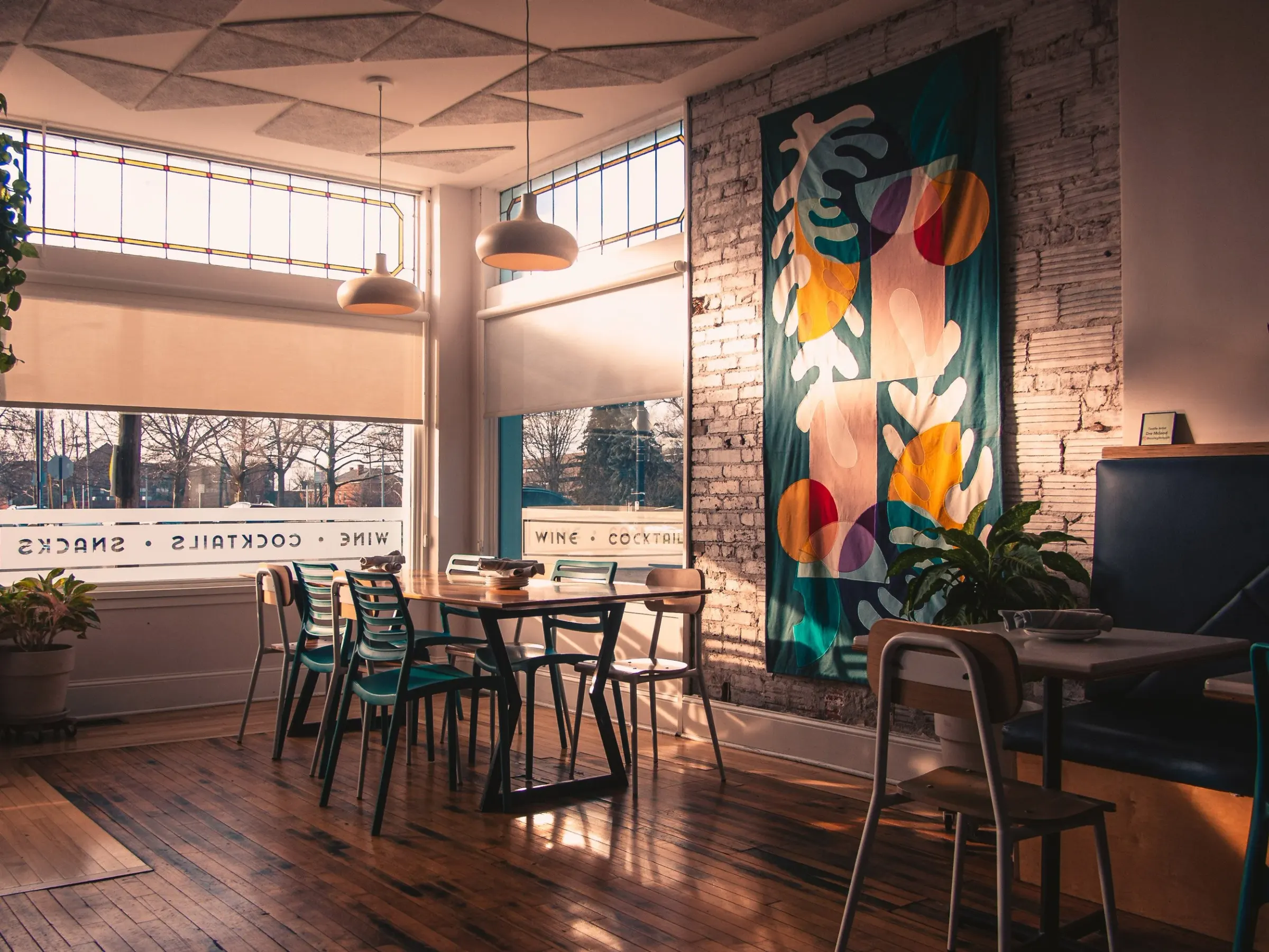 Large table by the front windows at Law Bird