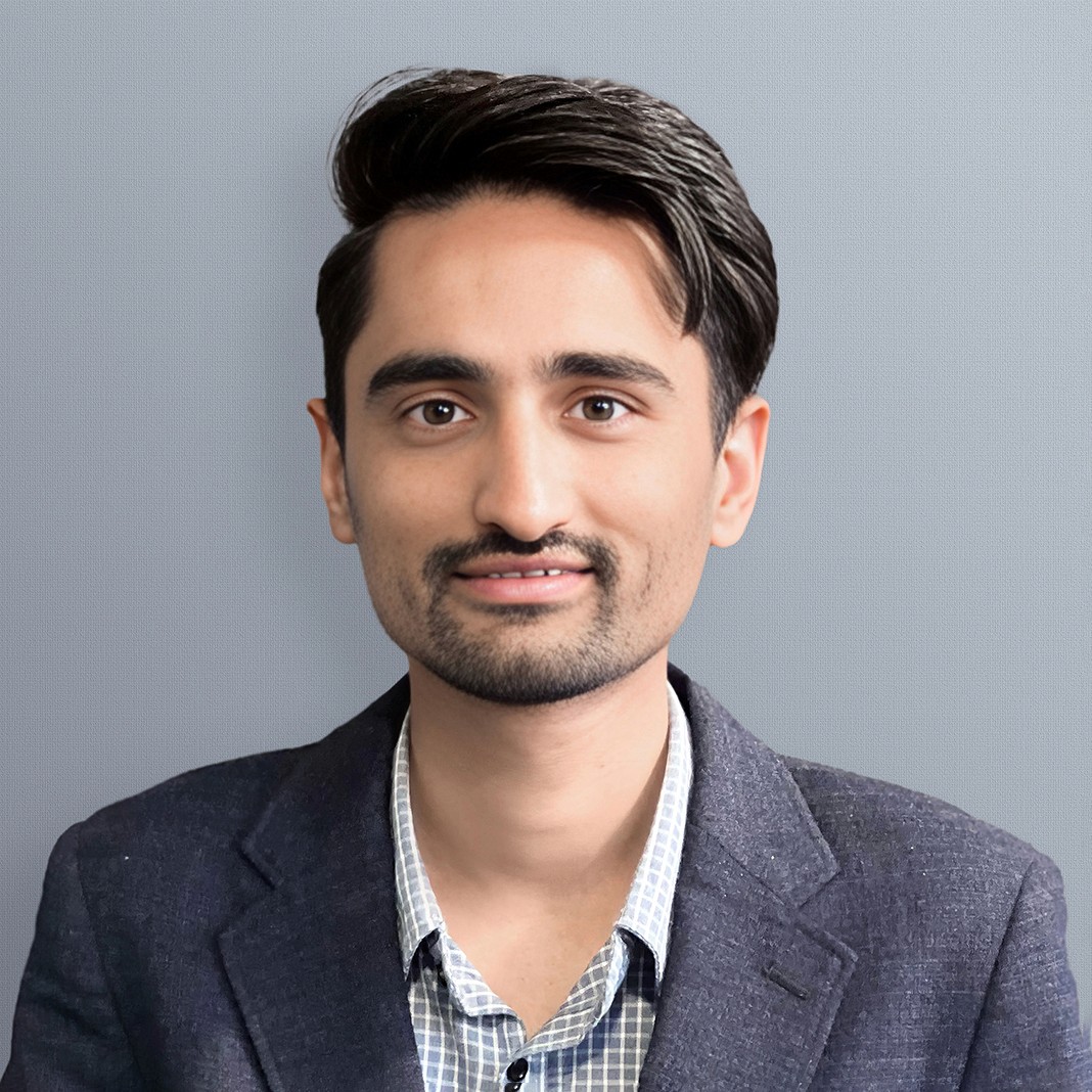 A photo of a man wearing a cap looking above