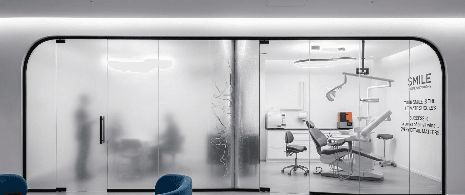 woman in blue tank top standing beside white wall