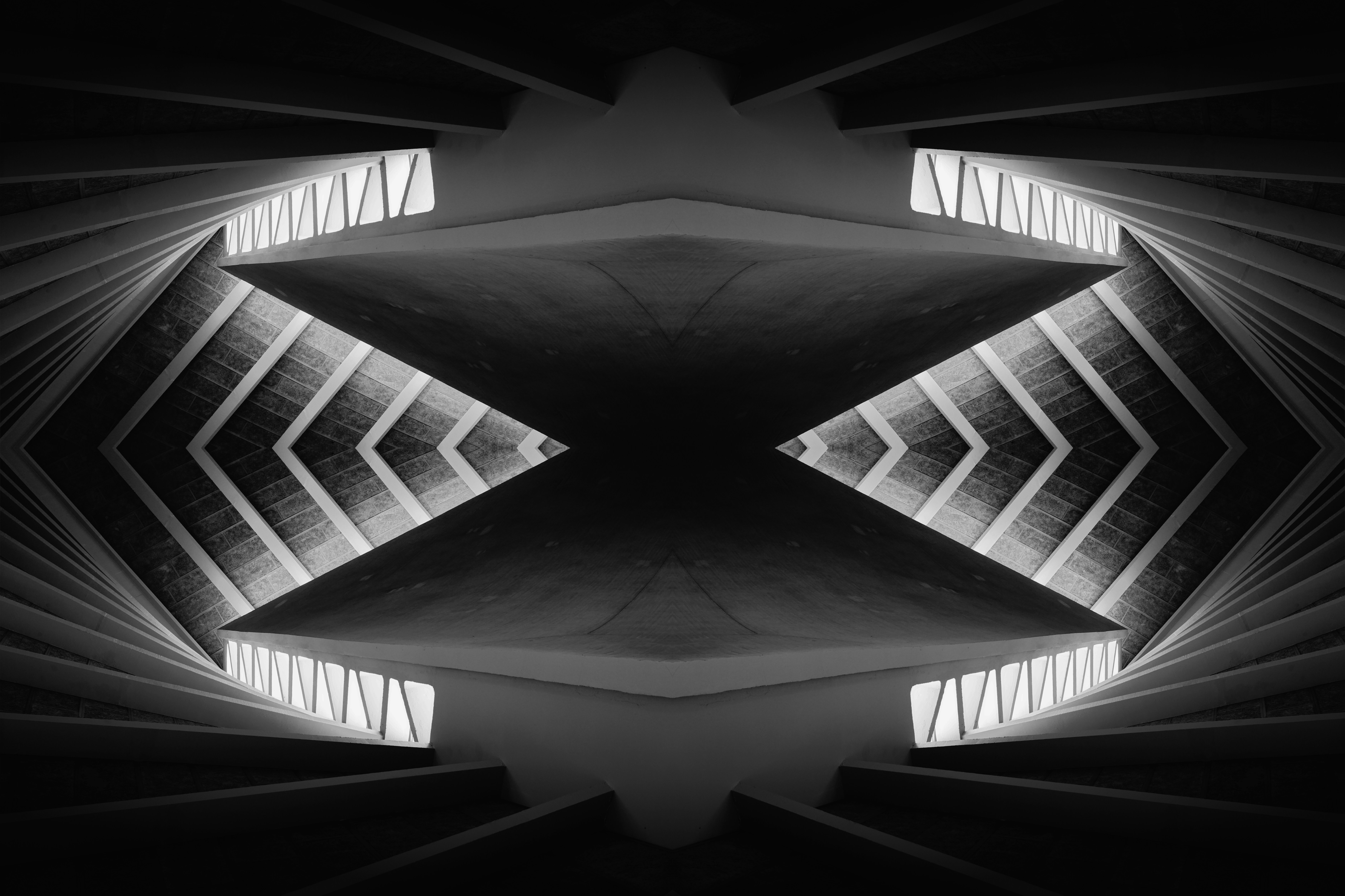 Symmetrical abstract architectural pattern in black and white.