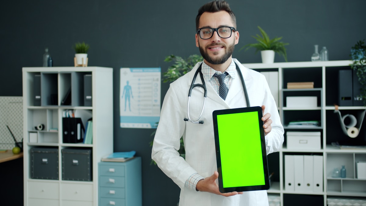 Doctor reviewing a digital operations dashboard