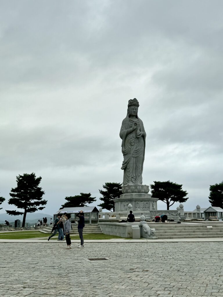 The tall Avalokiteshwara statue on the summit of Naksansa facing the Sea of Japan.