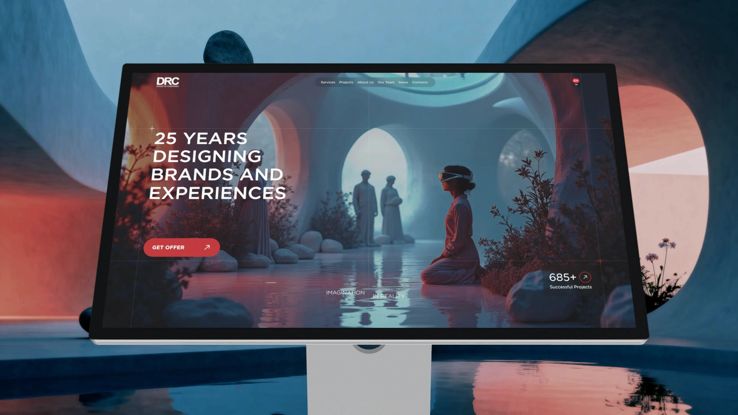 DRC agency website shown on a desktop monitor with a vivid event-themed hero composition.