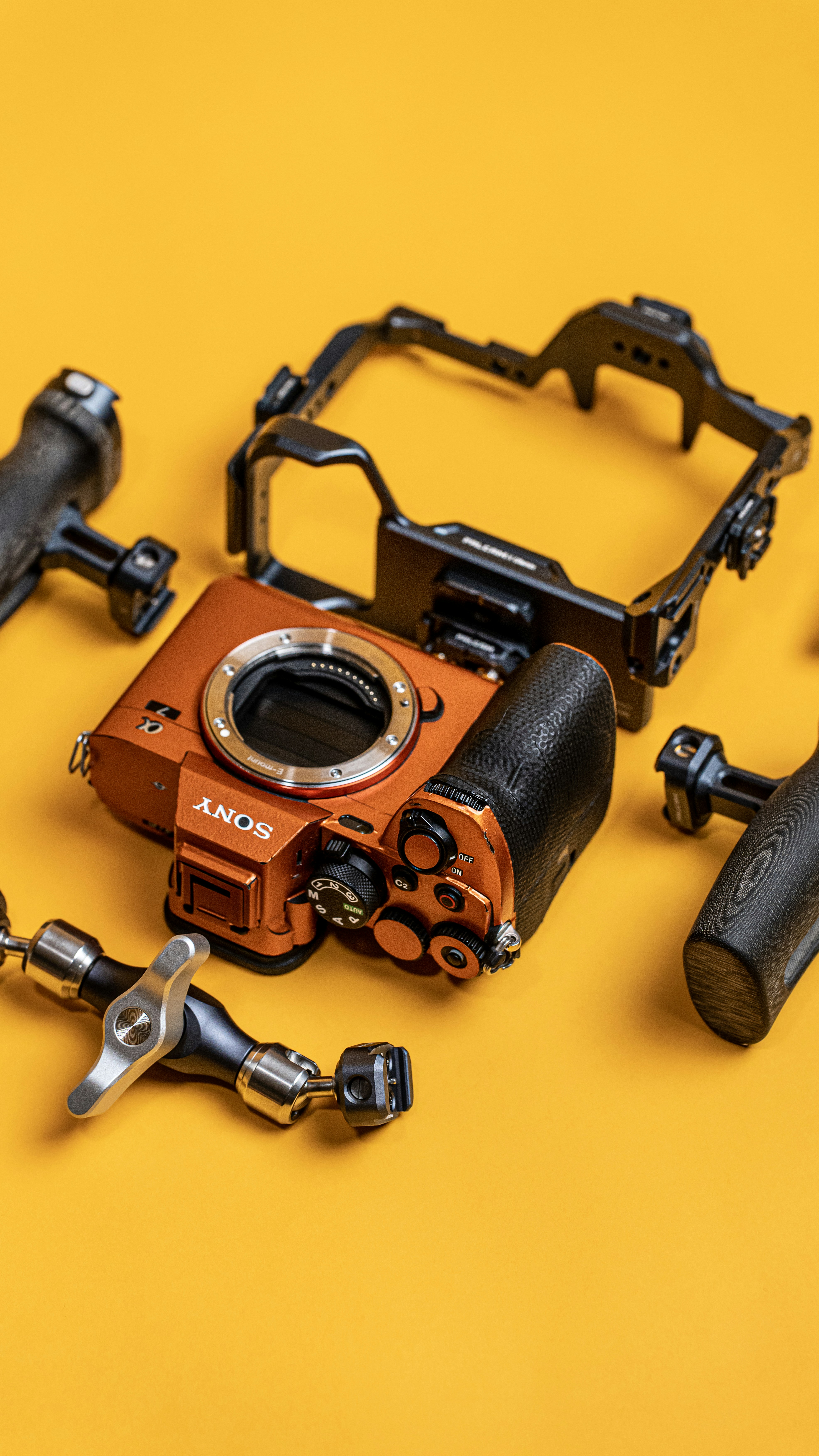 a camera sitting on top of a yellow table