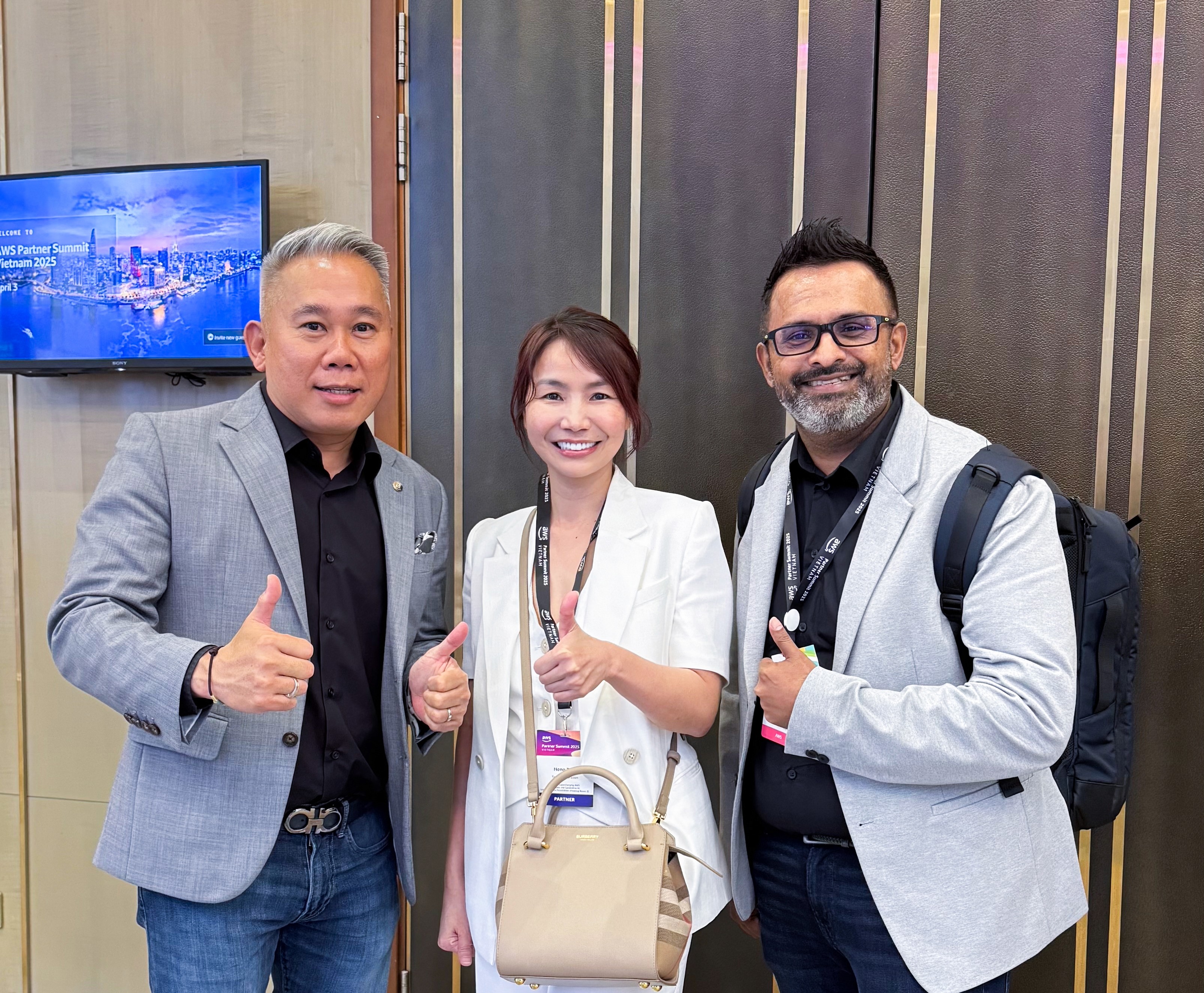 TechX's CEO and AWS Representatives at AWS Partner Summit Vietnam 2025 